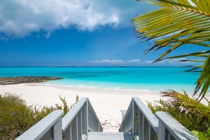 Caribbean coastline with turquoise waters and clear skies at Cap Cana beach