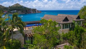 Beach Garden Villa in Chocolate Hole. luxury Caribbean retreat with four bedrooms, private pool, terraces overlooking the sea, and elegant indoor-outdoor living spaces ideal for families and friends.