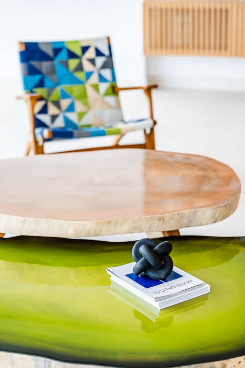 Elegant locally made chairs crafted in Costa Rica, featured in the dining area of the Reserva Conchal penthouse, blending contemporary design with artisanal craftsmanship.