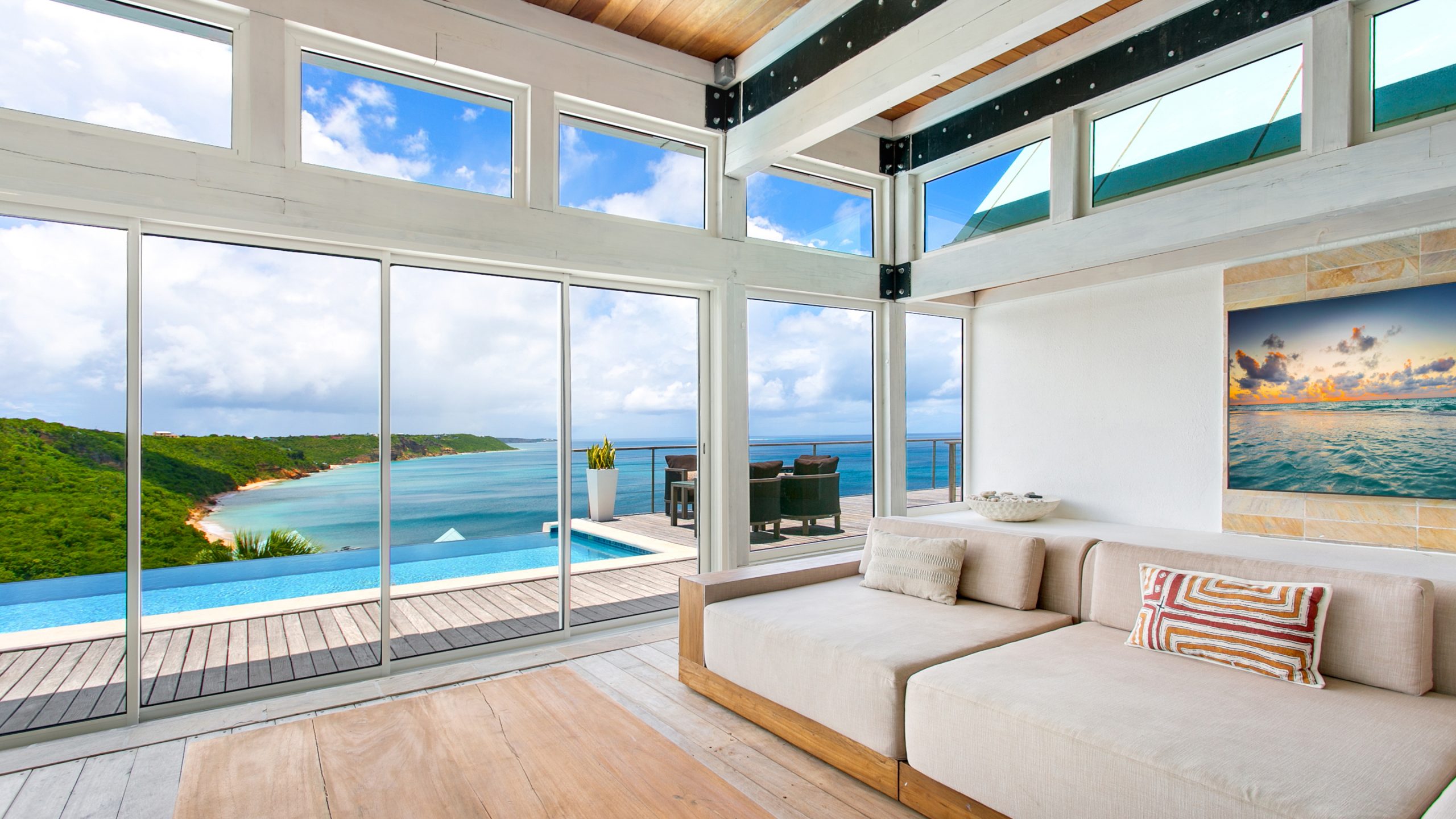 Luxury villa in Anguilla overlooking the Caribbean Sea, featuring elegant modern design and panoramic ocean views.