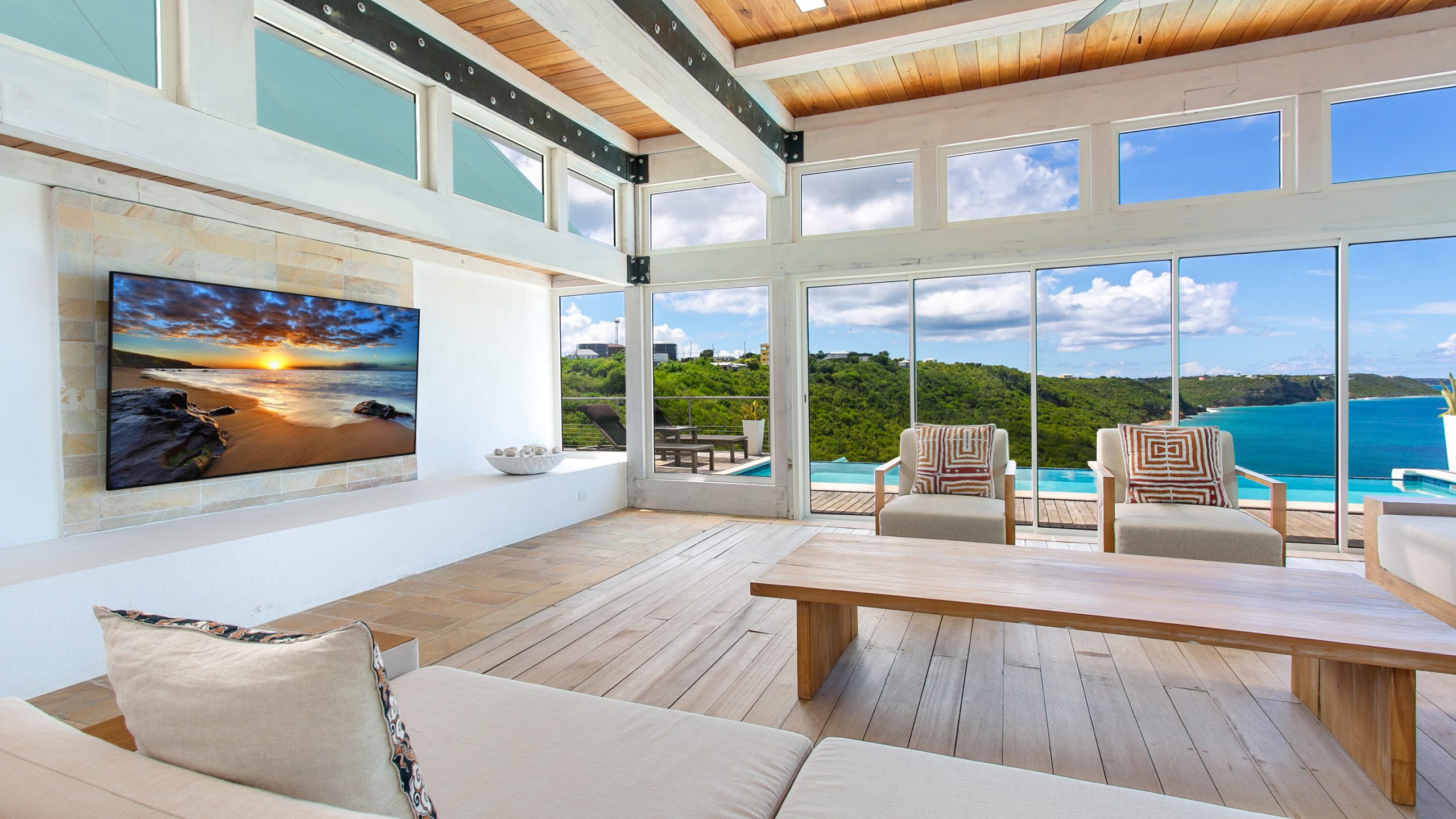 Luxury villa in Anguilla overlooking the Caribbean Sea, featuring elegant modern design and panoramic ocean views.