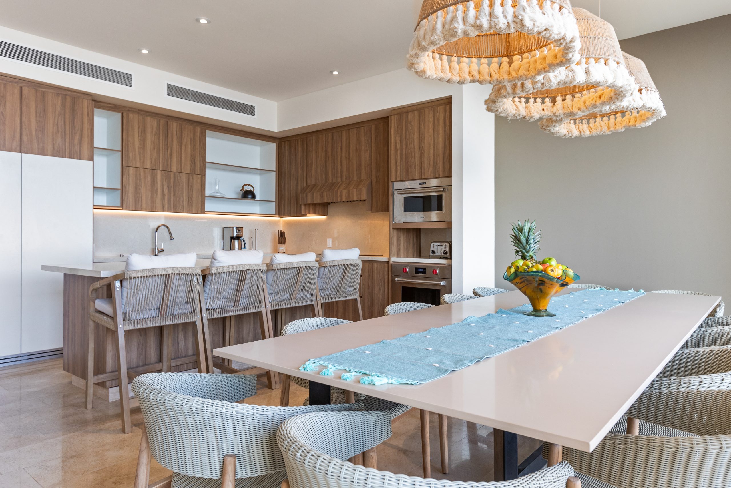 Modern luxury villa in Nuevo Vallarta, Mexico featuring contemporary architecture, private pool, and tropical garden views near the beach.