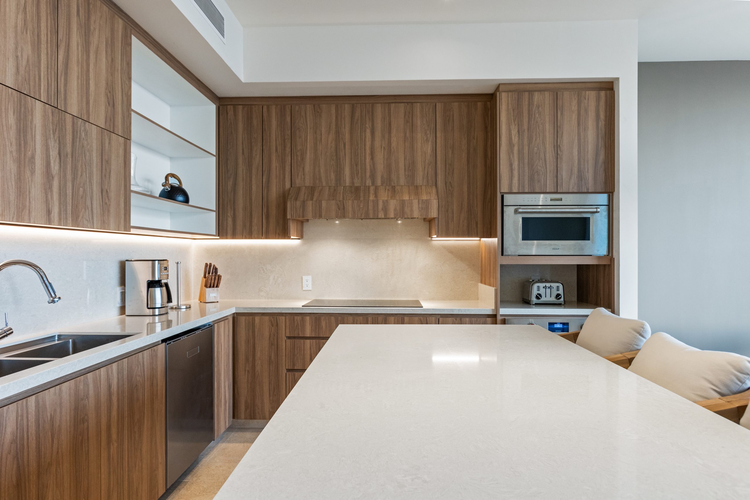 Modern luxury villa in Nuevo Vallarta, Mexico featuring contemporary architecture, private pool, and tropical garden views near the beach.