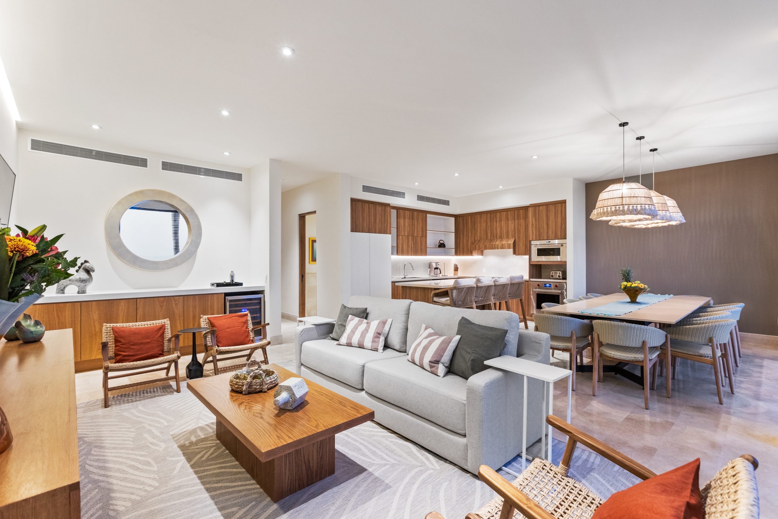 Modern luxury villa in Nuevo Vallarta, Mexico featuring contemporary architecture, private pool, and tropical garden views near the beach.