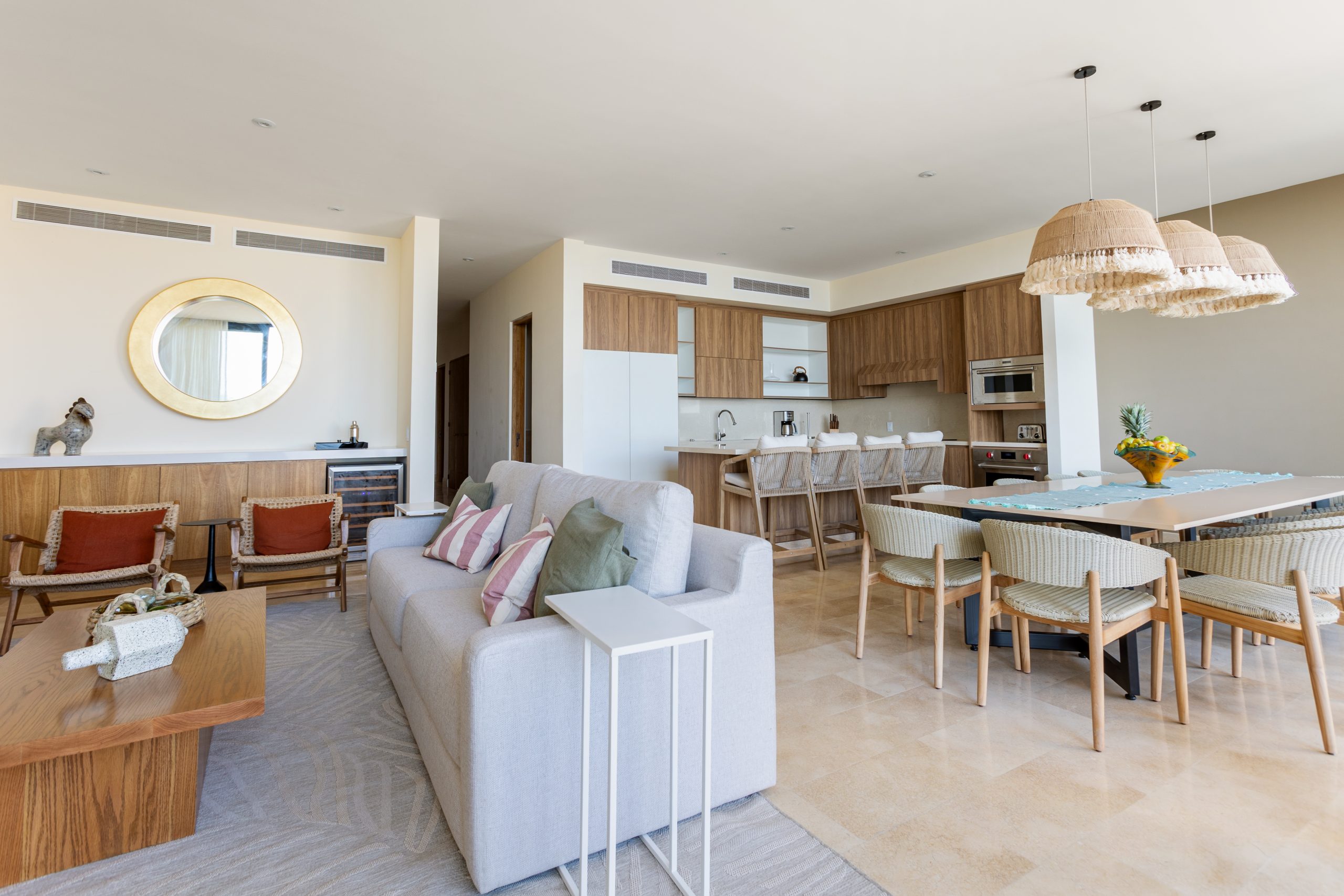 Modern luxury villa in Nuevo Vallarta, Mexico featuring contemporary architecture, private pool, and tropical garden views near the beach.