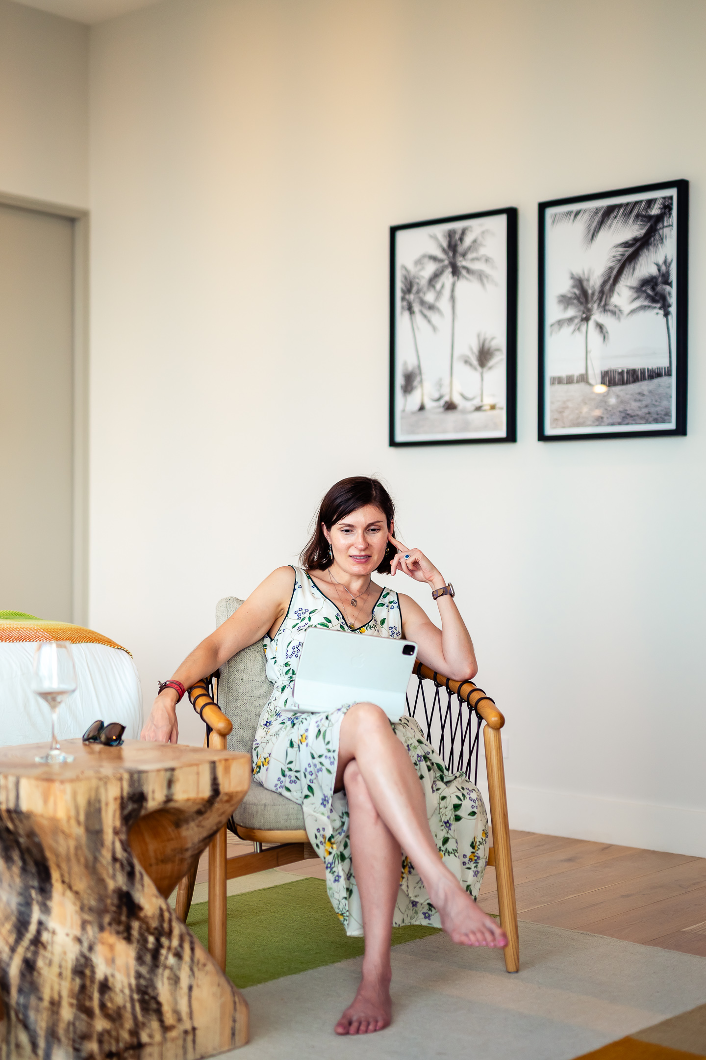 Marina Salley relaxing inside the Reserva Conchal penthouse, surrounded by elegant décor and views of Costa Rica’s lush landscape.