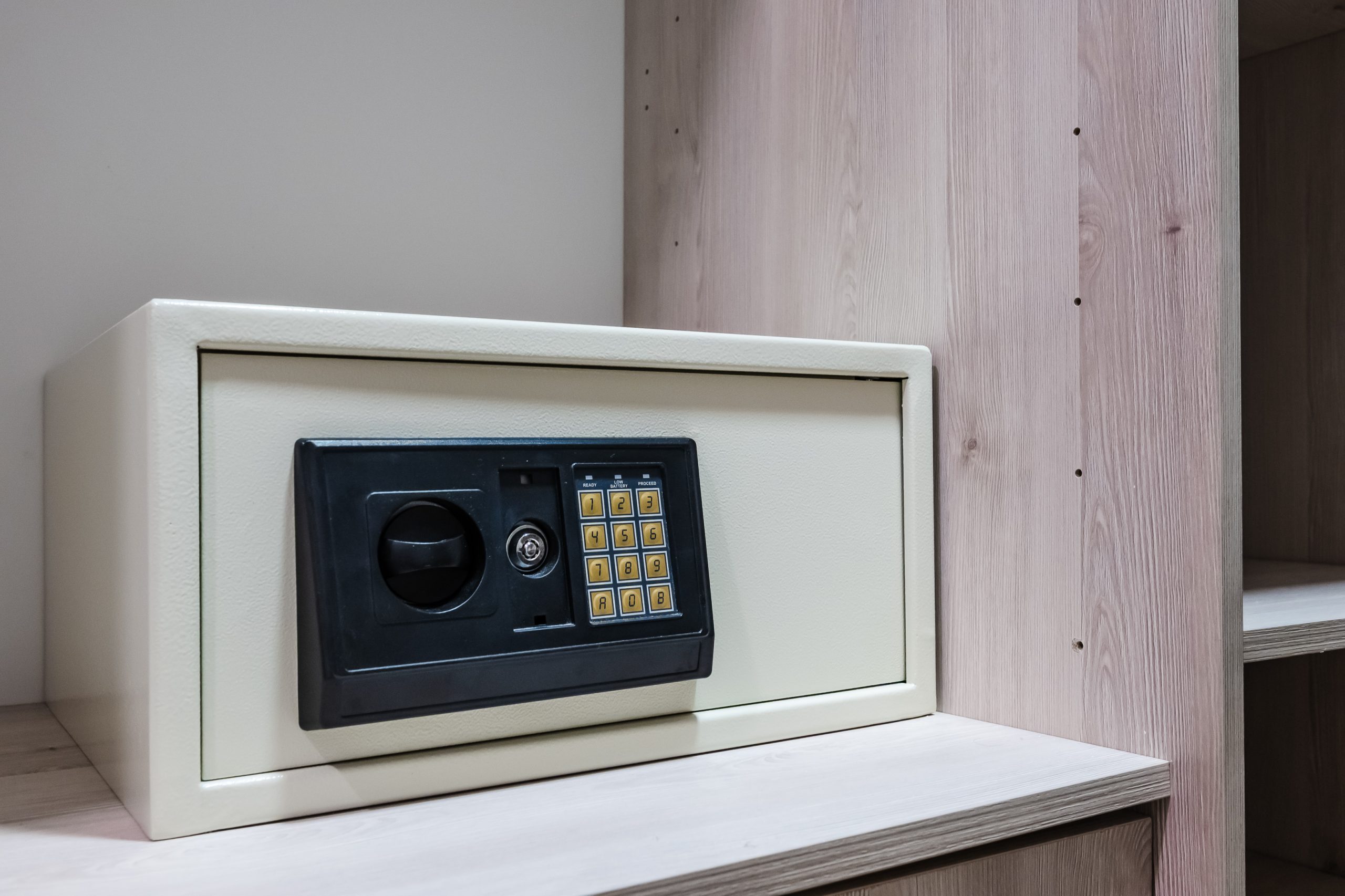 Spacious walk-in closet with built-in storage and a safe inside the Reserva Conchal penthouse, offering elegant design and modern convenience.