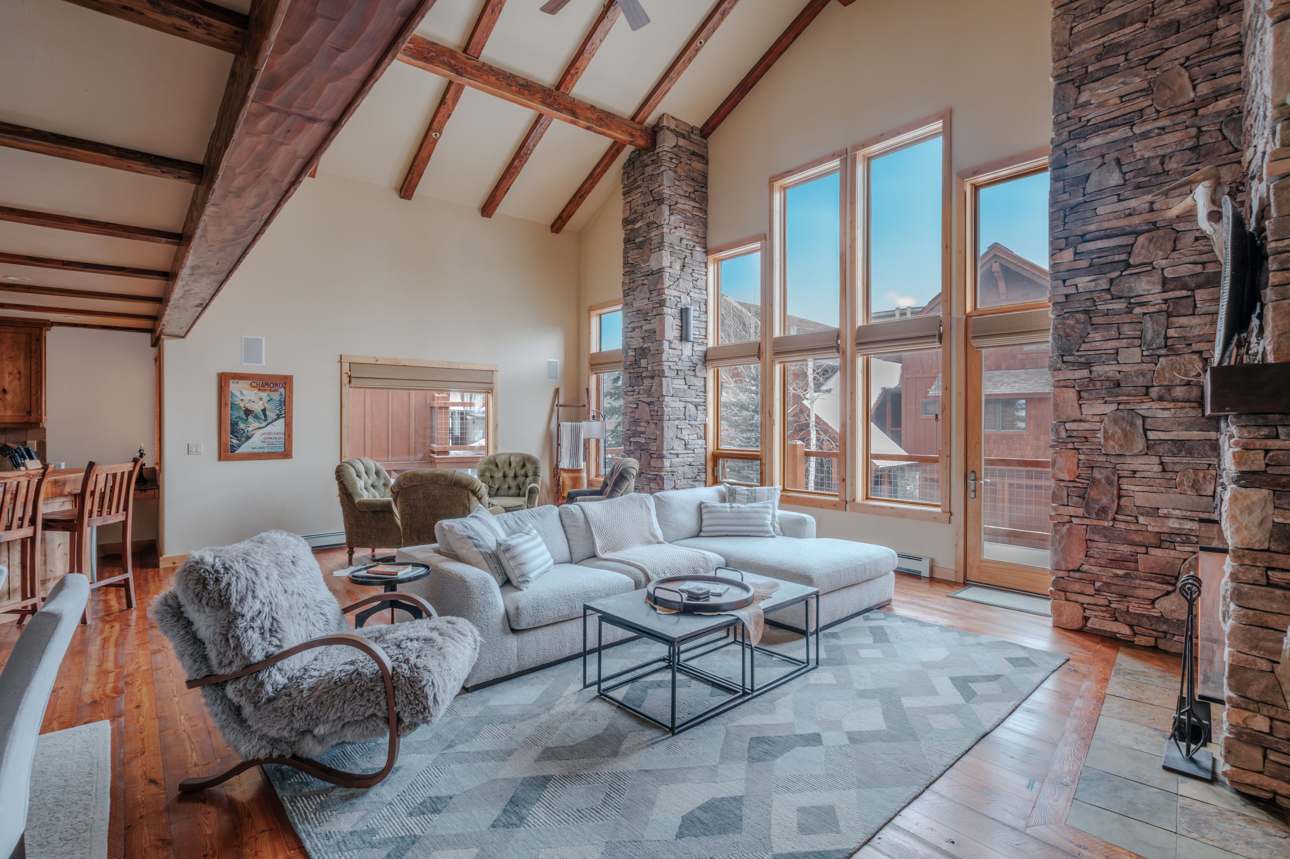 Luxury Mountain home in Big Sky Resort featuring vaulted ceilings and cozy interiors for a relaxing vacation with your family and friends