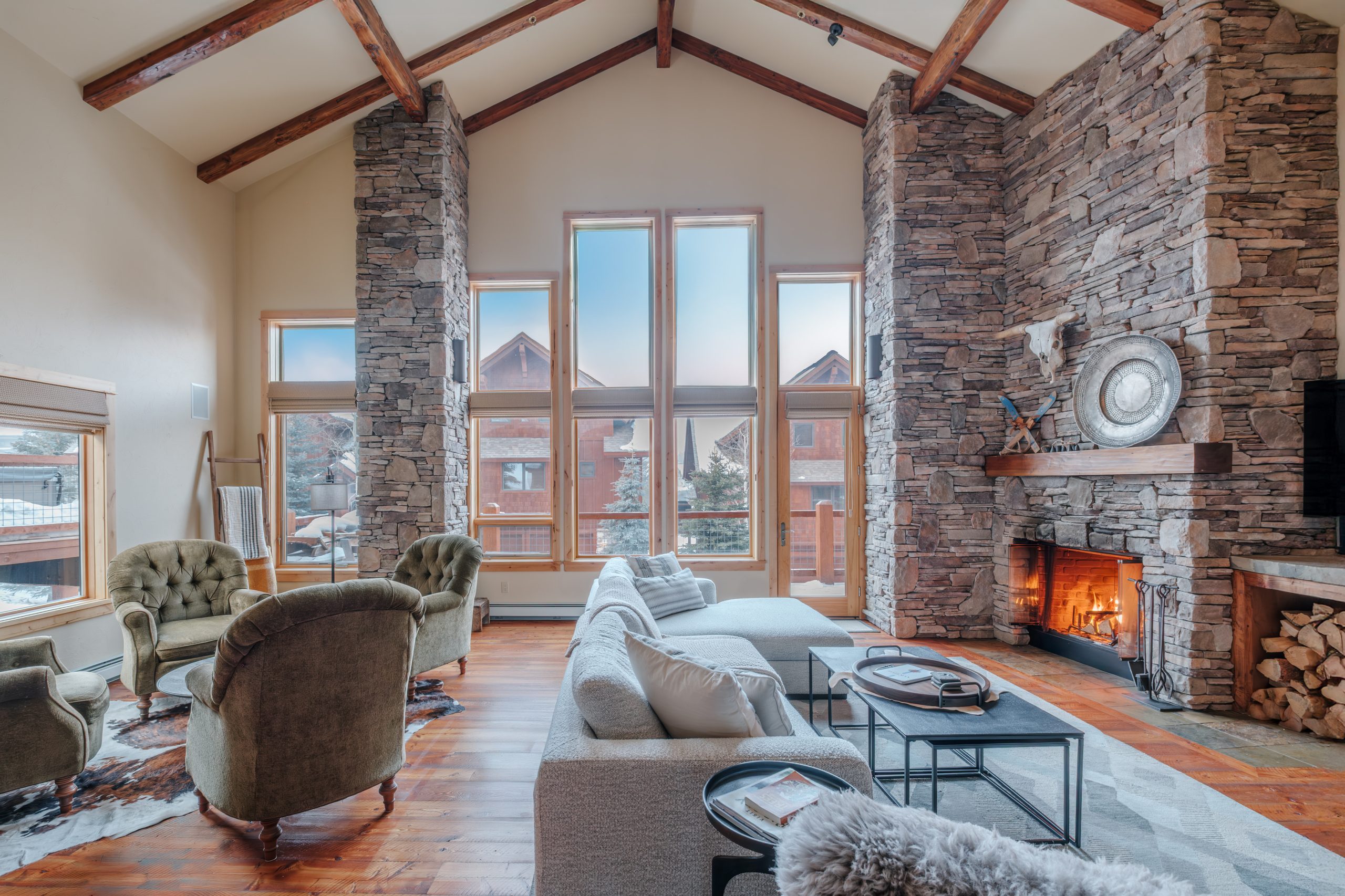 Luxury Mountain home in Big Sky Resort featuring vaulted ceilings and cozy interiors for a relaxing vacation with your family and friends