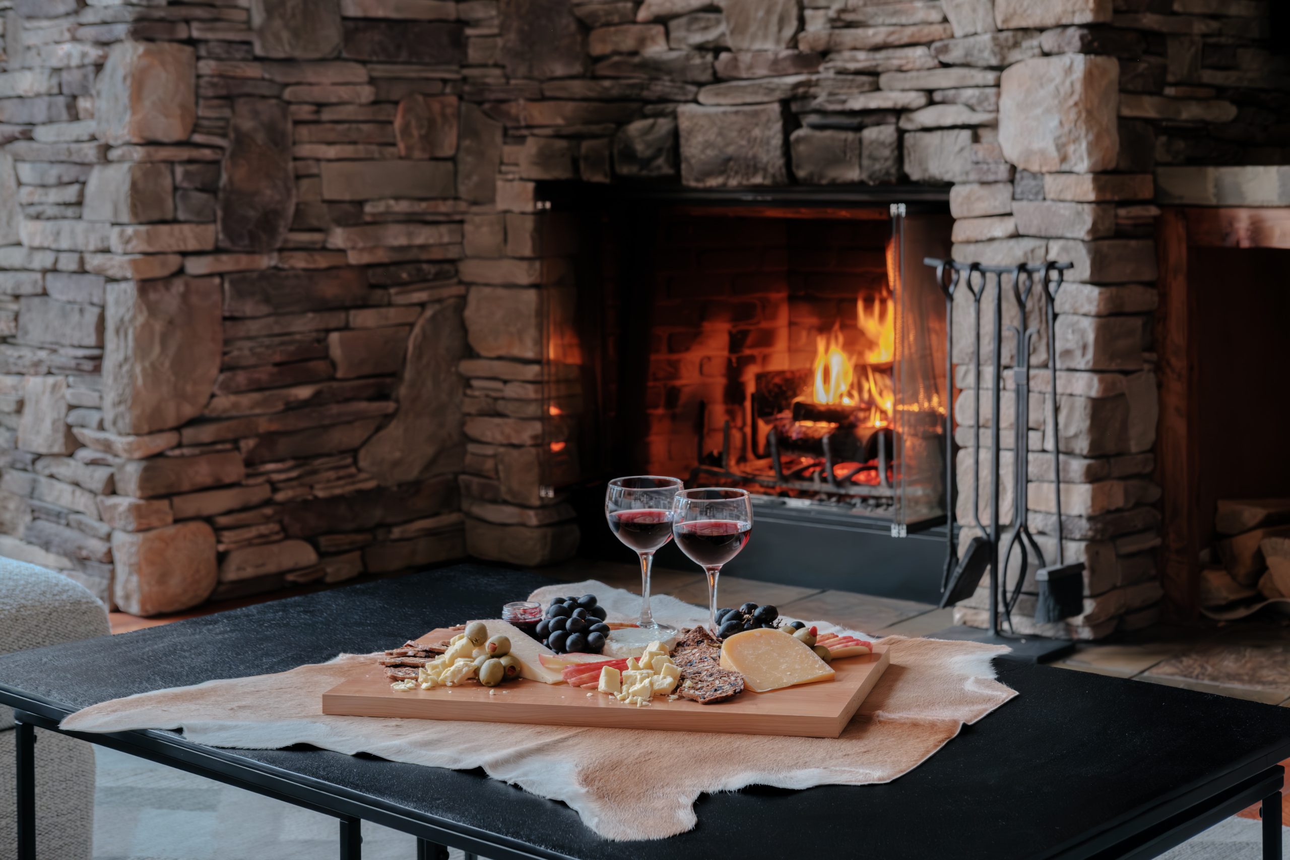 Luxury Mountain home in Big Sky Resort featuring vaulted ceilings and cozy interiors for a relaxing vacation with your family and friends