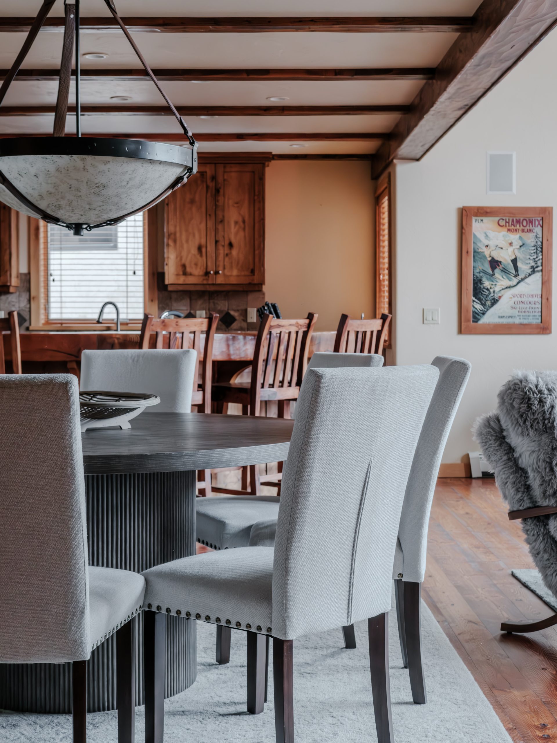 Elegant dining area with mountain views in Big Sky luxury property.