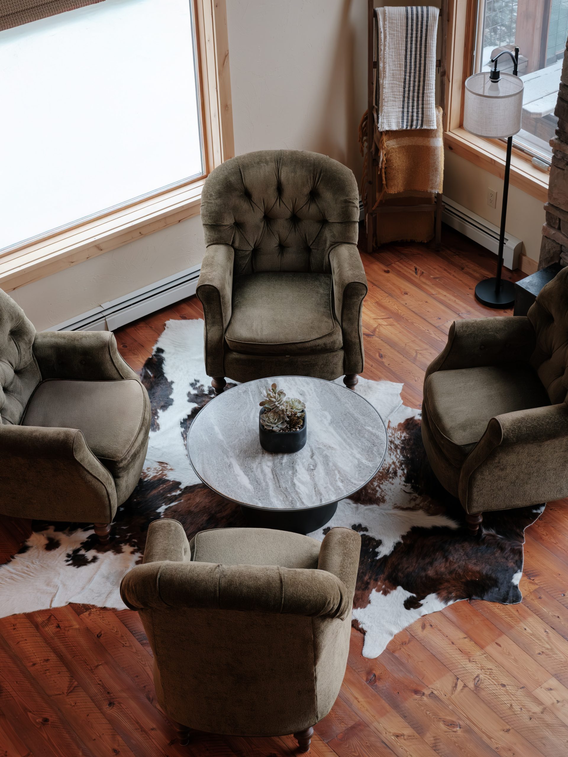 High-end mountain home living room with dramatic vaulted ceilings in Big Sky Resort, Montana