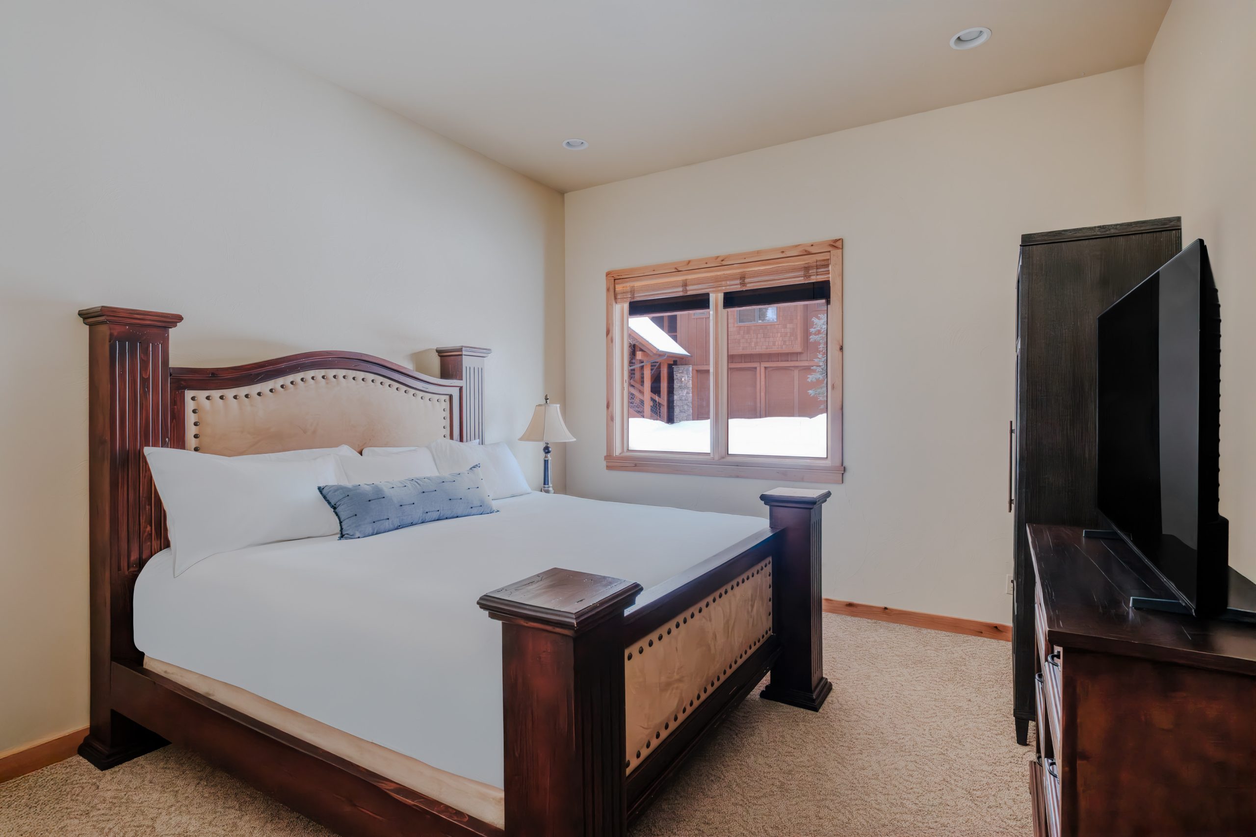 Cozy mountain bedroom retreat at Big Sky Resort.