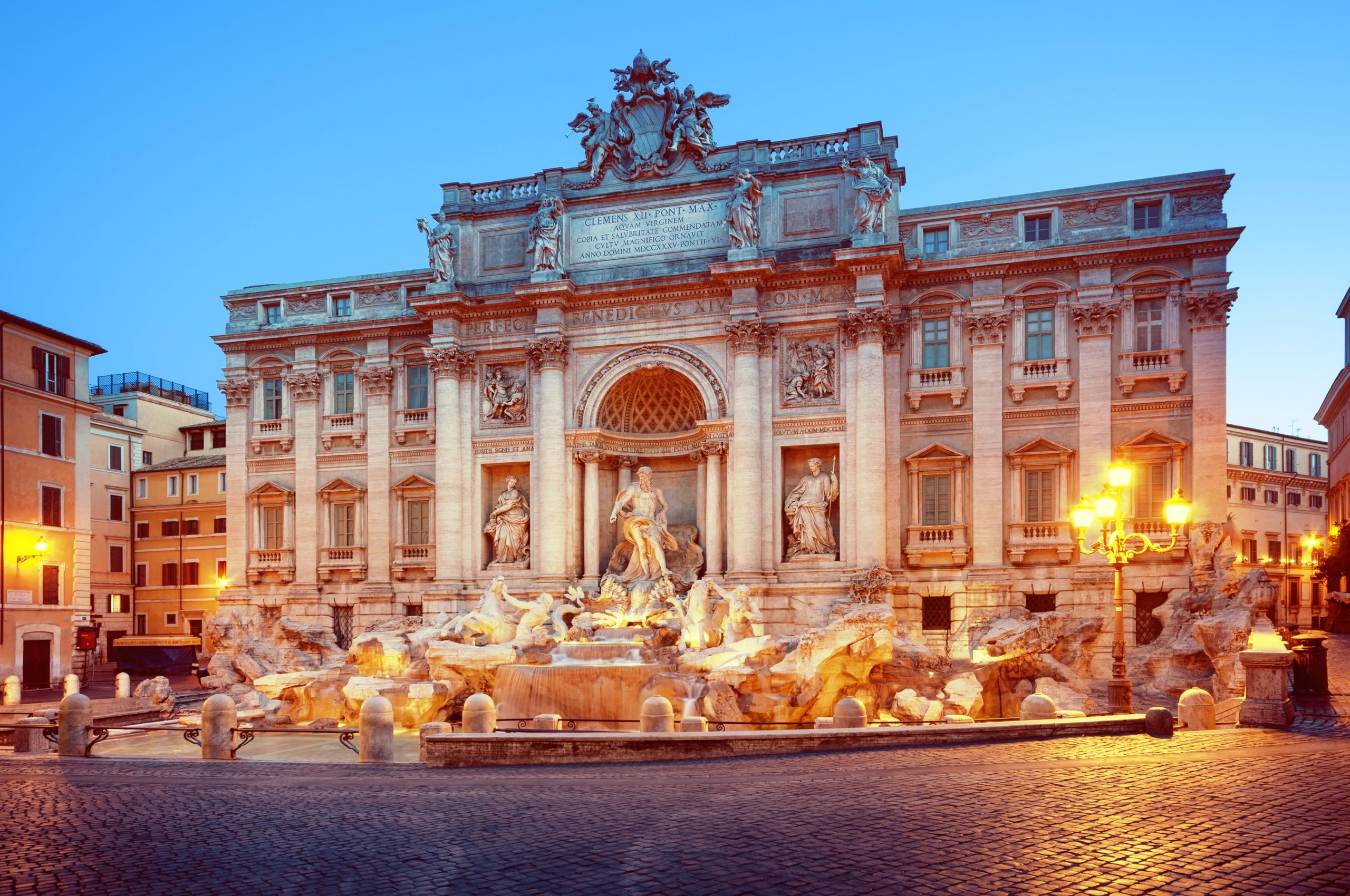 Trevi Fountain in Rome with Baroque architecture and flowing water