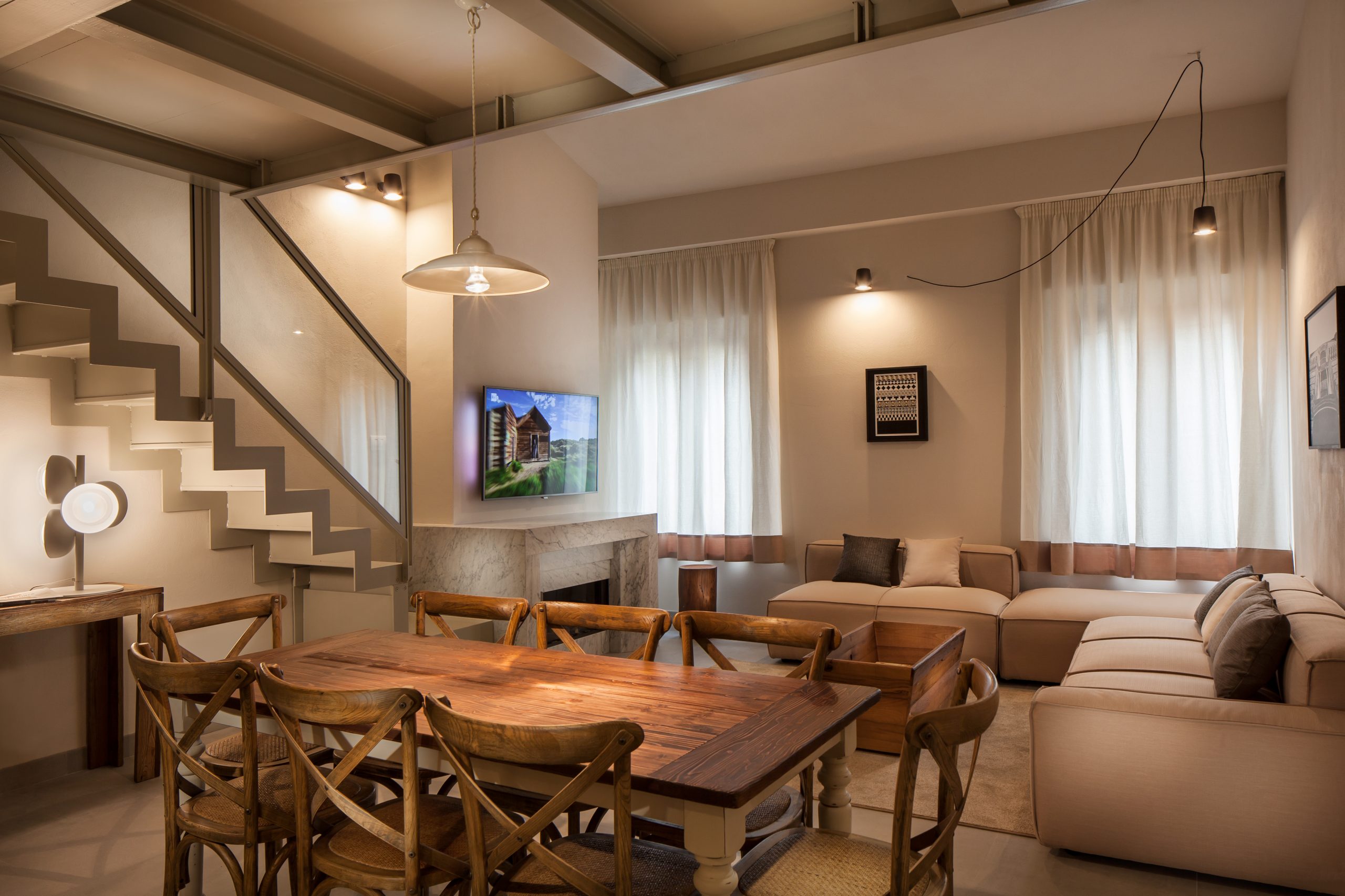 Warm and Cozy Dining Room and Living Room with Fireplace Luxury Penthouse in Siena