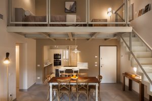 Warm and Cozy Modern Dining and Kitchen in a Luxury Penthouse in Siena