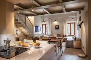 Luxury modern Siena apartment featuring a view of the dining room and kitchen by Equity Residences 