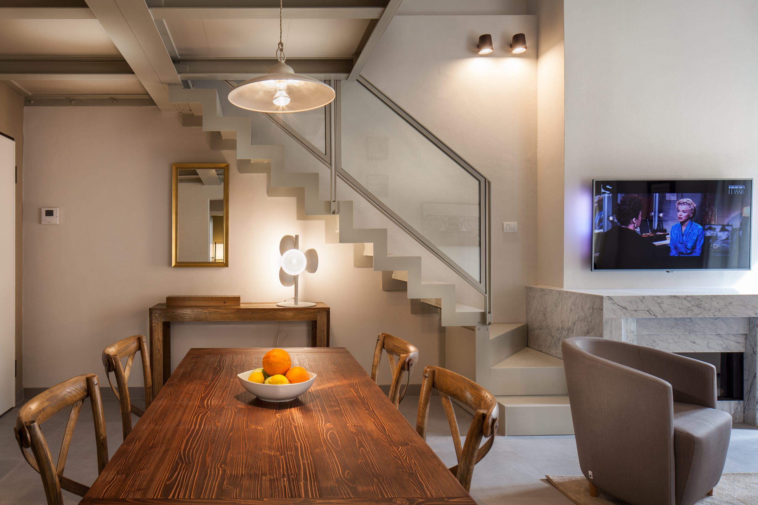 Modern White Stairs to the Loft in a Luxury Penthouse in Siena