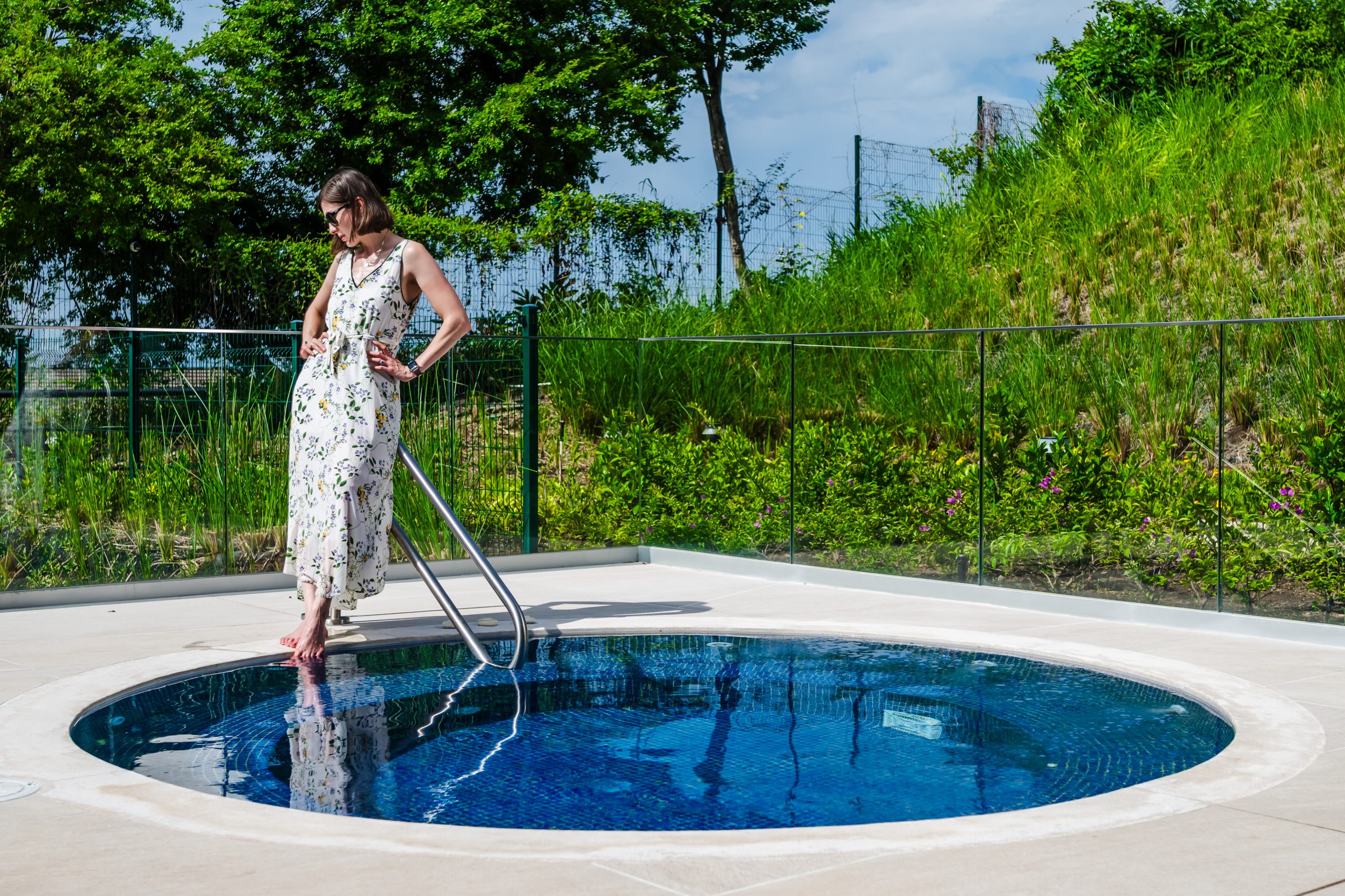 Head of Investor Relations Marina Salley Takes a dip in the Solaris Reserva Conchal Jacuzzi in Costa Rica