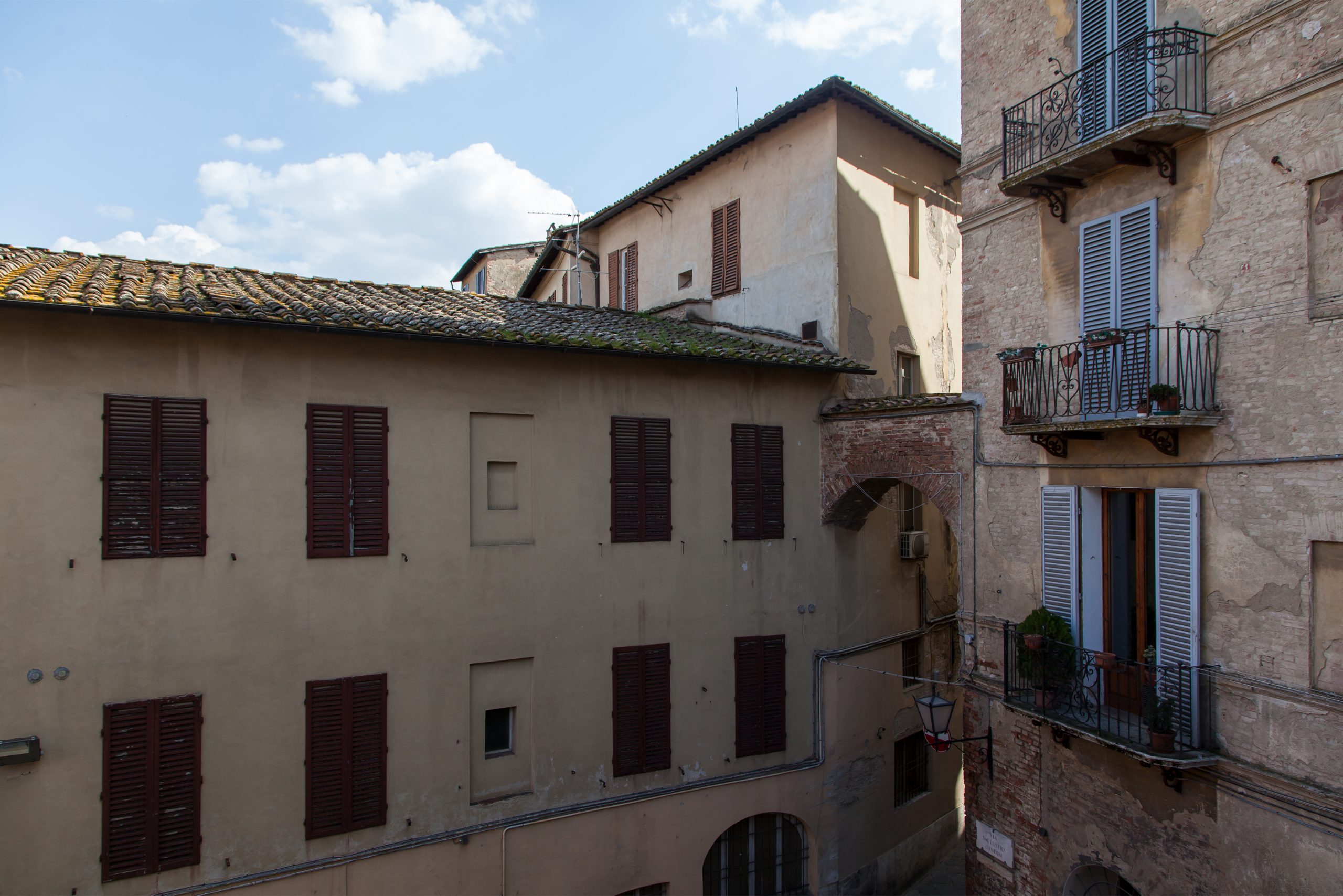 Historic Siena Architecture View from a Balcony in a Luxury Penthouse in Siena, Italy