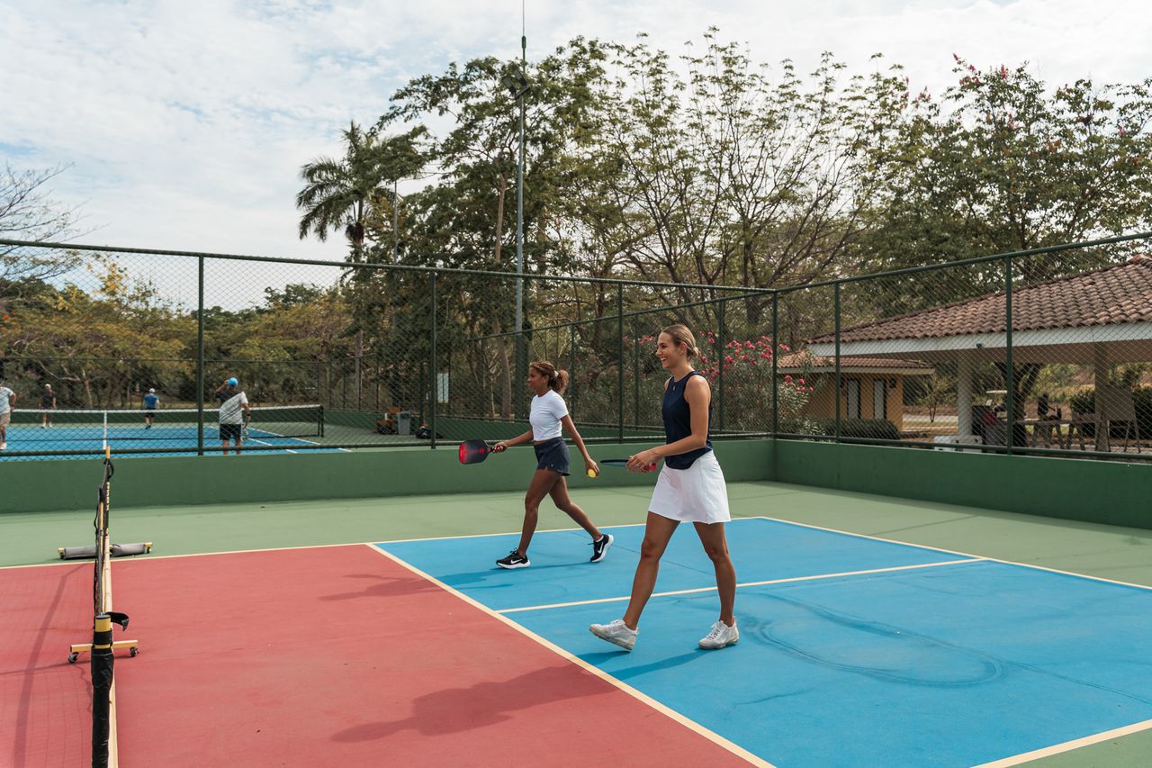 Reserva Conchal - Friends playing Pickleball