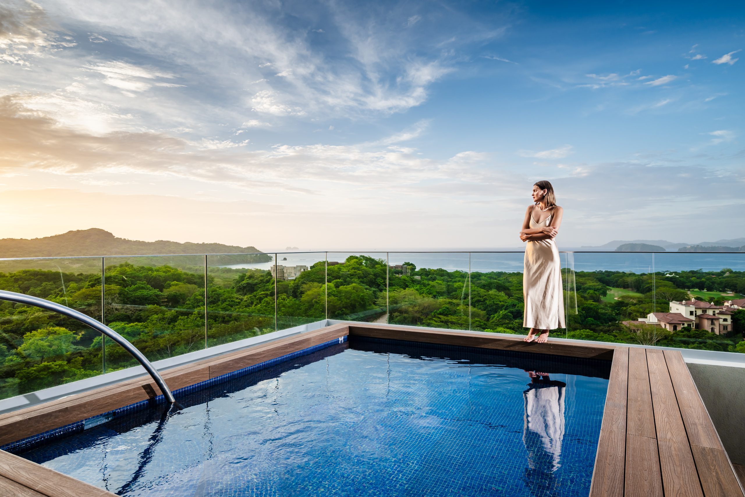 Woman Relaxing On the Solaris Reserva Conchal Penthouse Overlooking the Pacific in Costa Rica