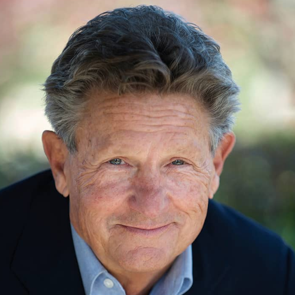 Steve Dering in a blue blazer, representing the team at Equity Residences, a luxury real estate investment firm.