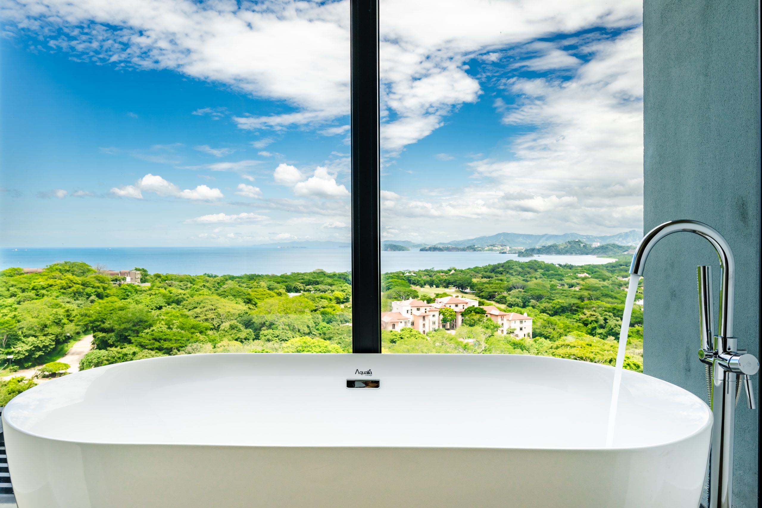 Luxury Modern Bathroom with Floor to Window Ocean View at Solaris Reserva Conchal Penthouse in Costa Rica