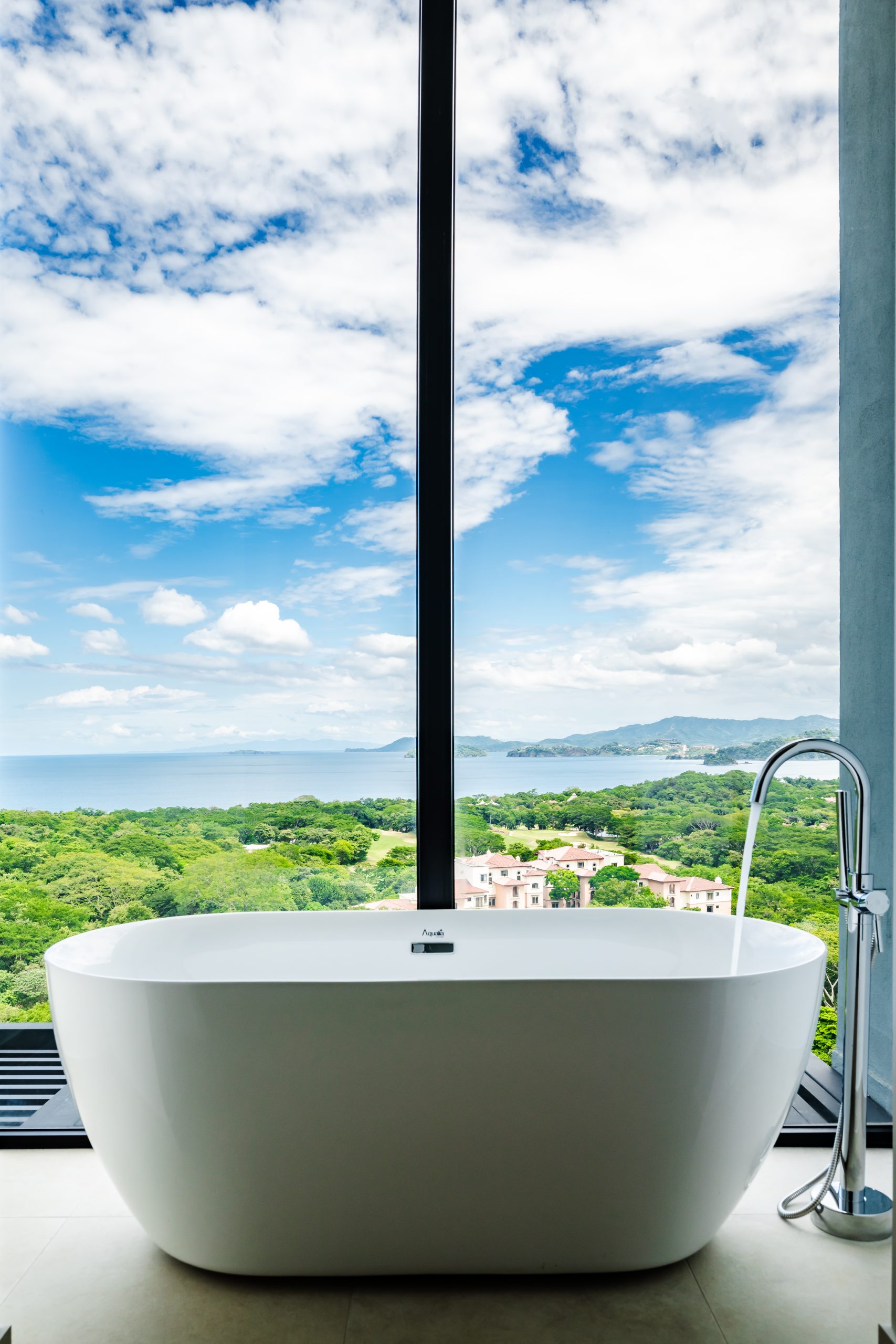 Luxury Modern Bathroom with Floor to Window Ocean View at Solaris Reserva Conchal Penthouse in Costa Rica