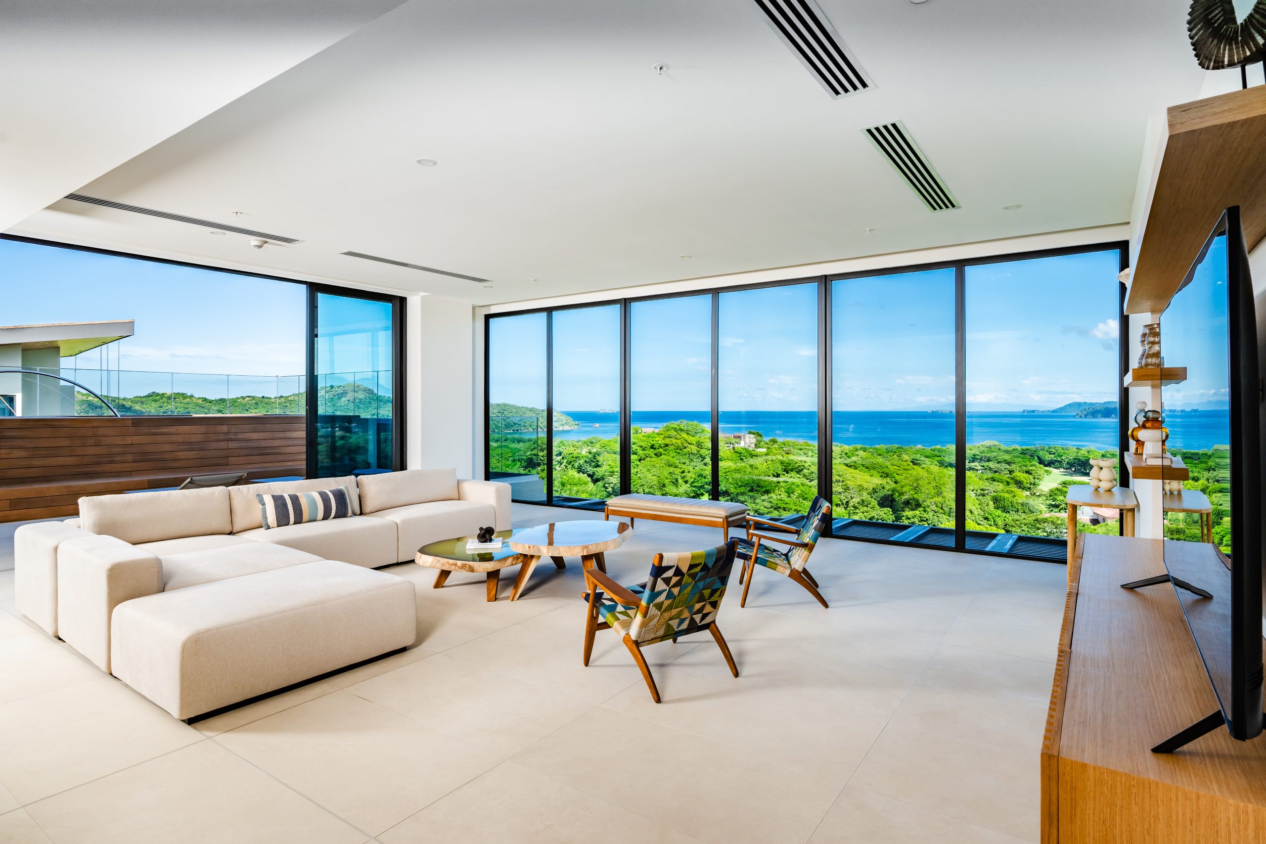 Ocean view living room in Reserva Conchal penthouse