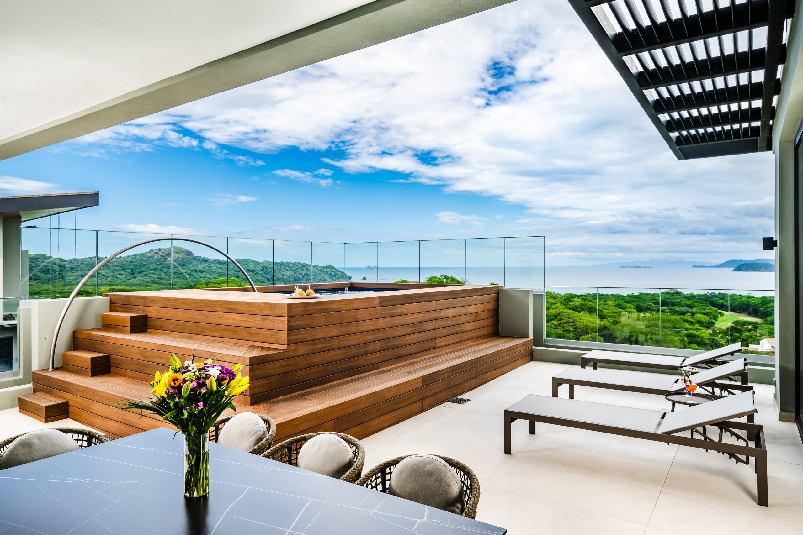 Reserva Conchal penthouse featuring private balcony and ocean vistas