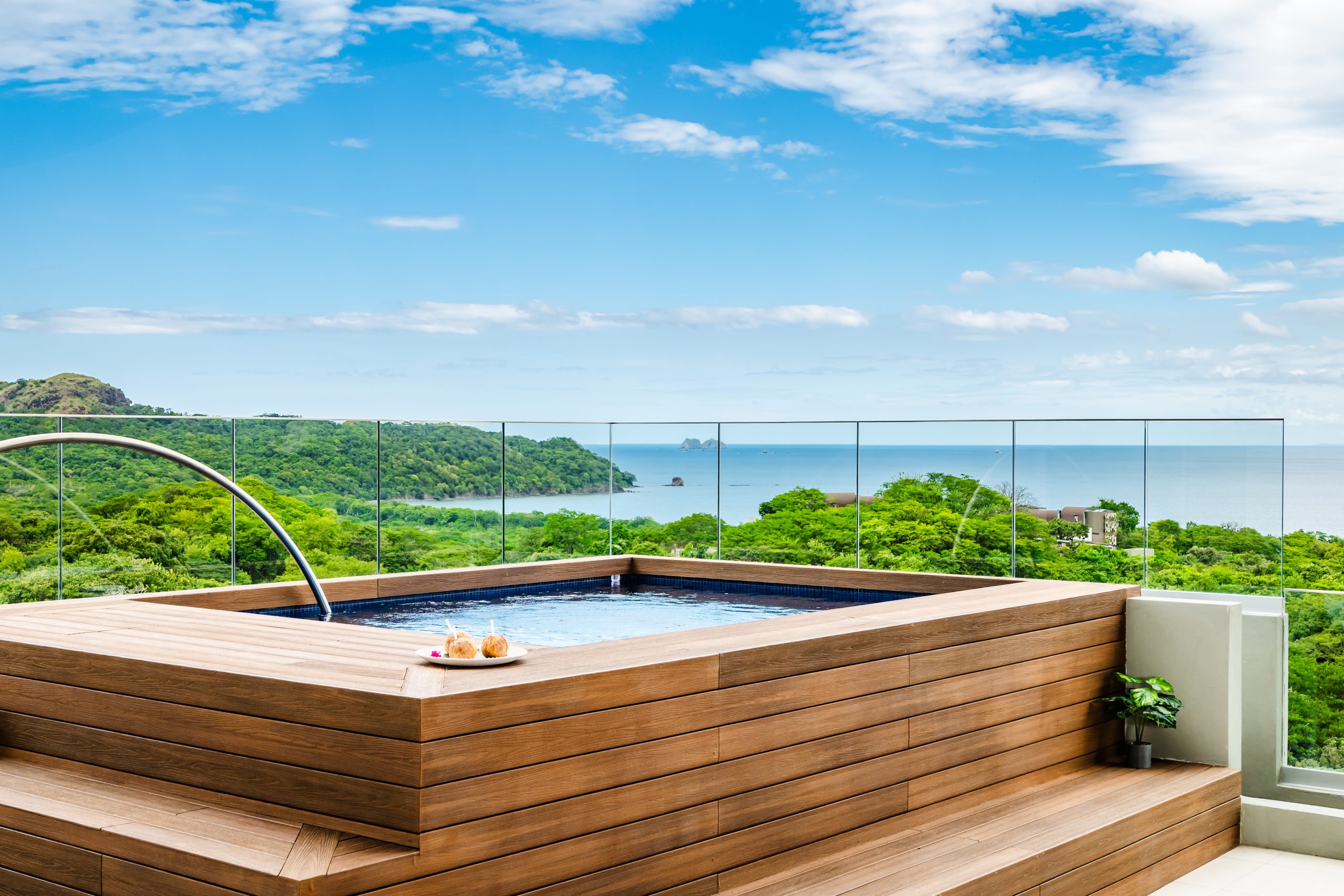 Reserva Conchal penthouse featuring private balcony and ocean vistas