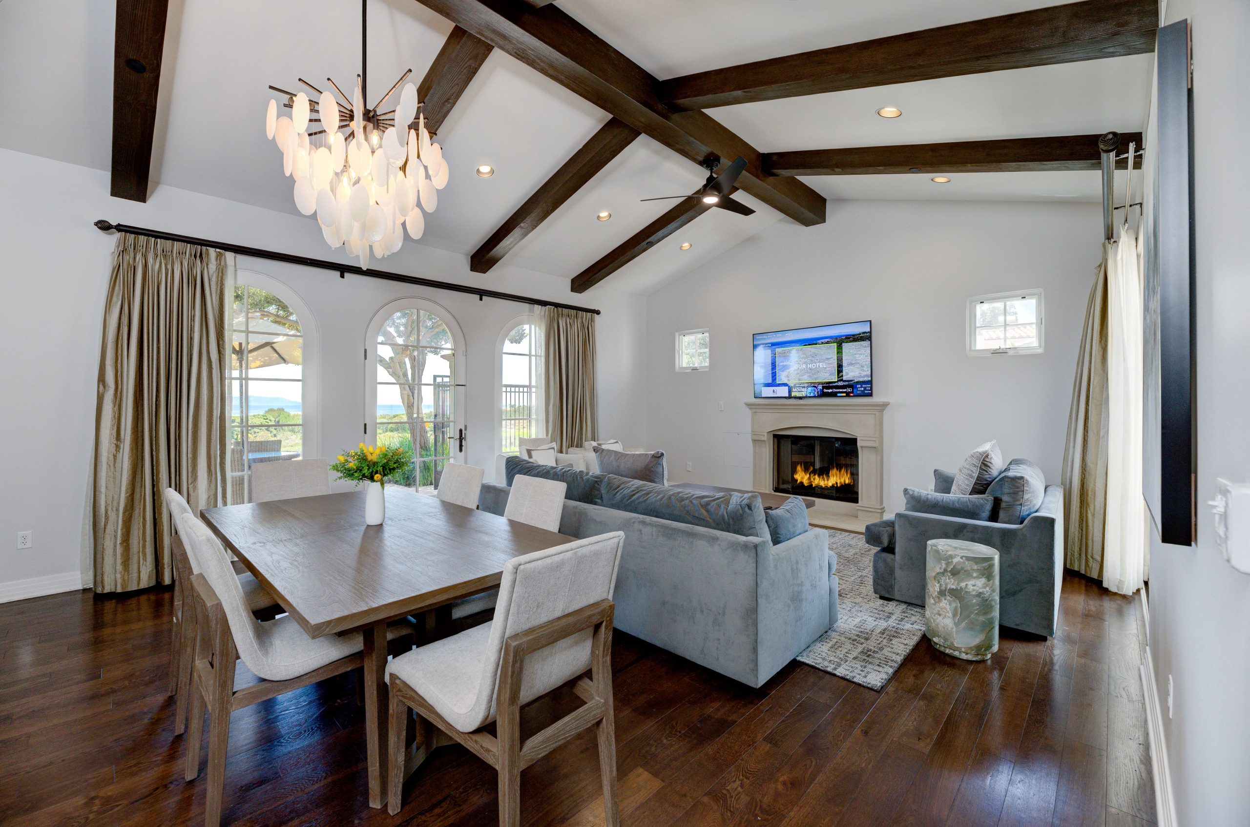 Terranea Resort villa living room and dining area with ocean‑view windows