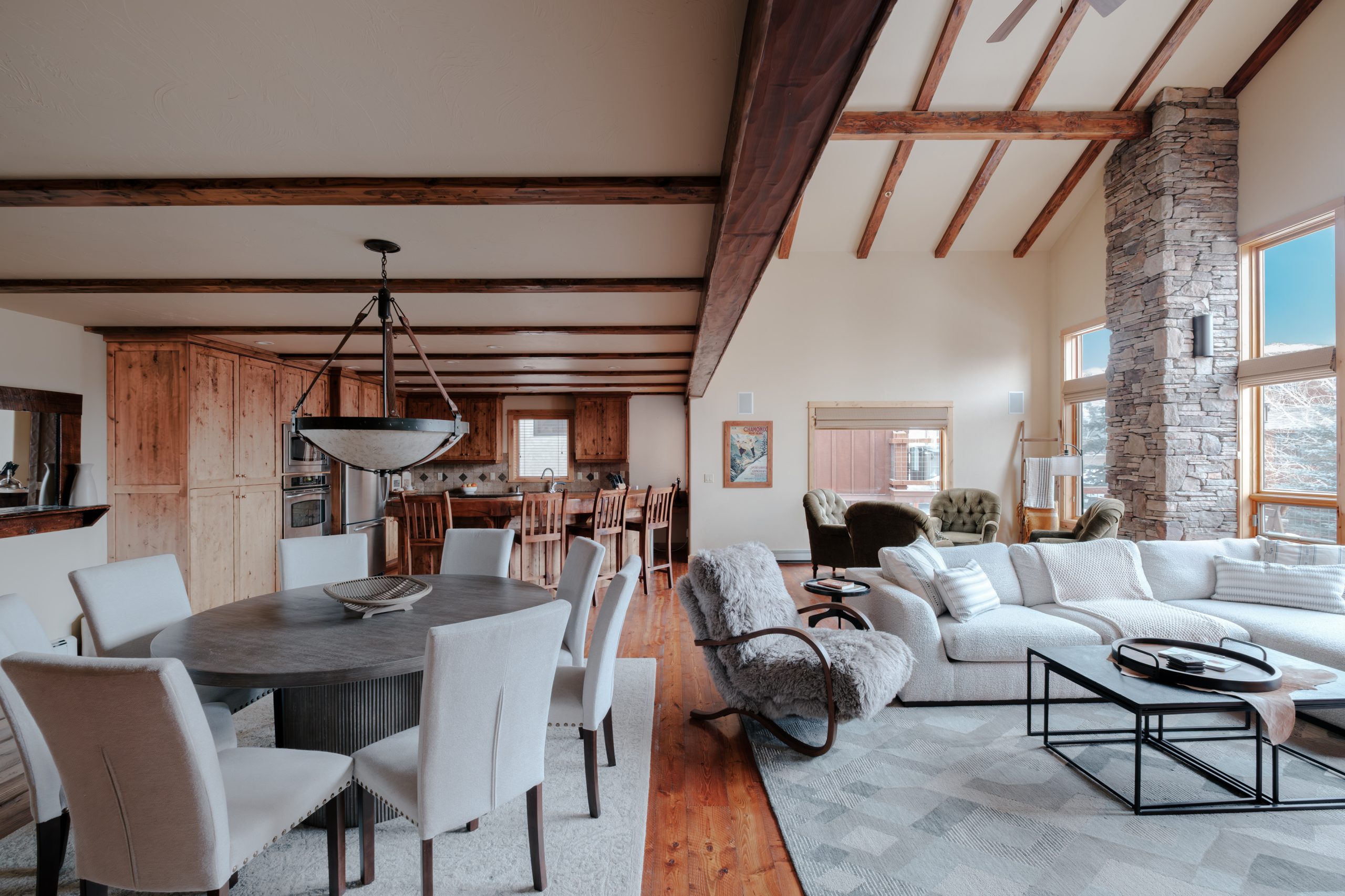 Big Sky Montana mountain home living room featuring a cozy fireplace.