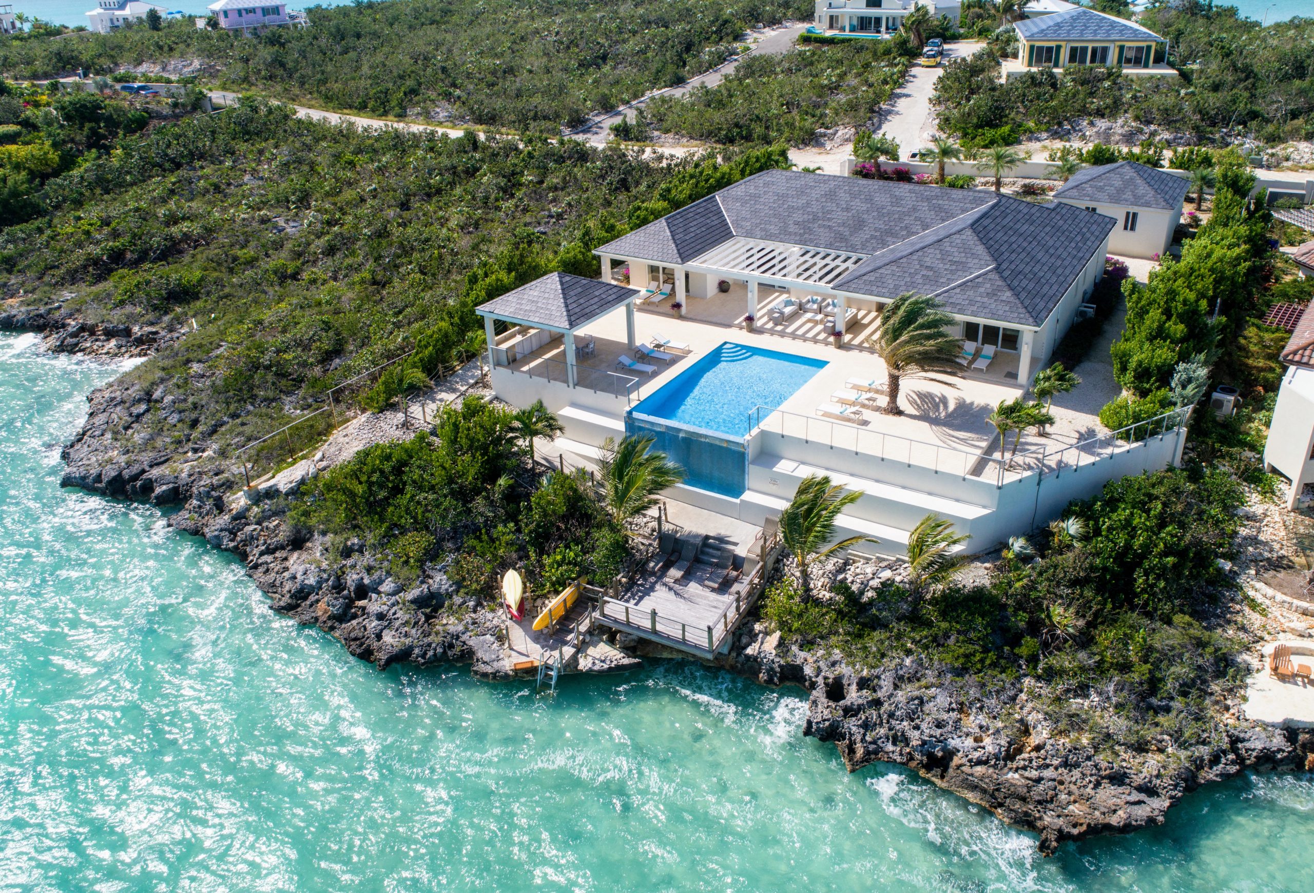villa capri luxury waterfront home in anguilla with infinity pool and panoramic lagoon views