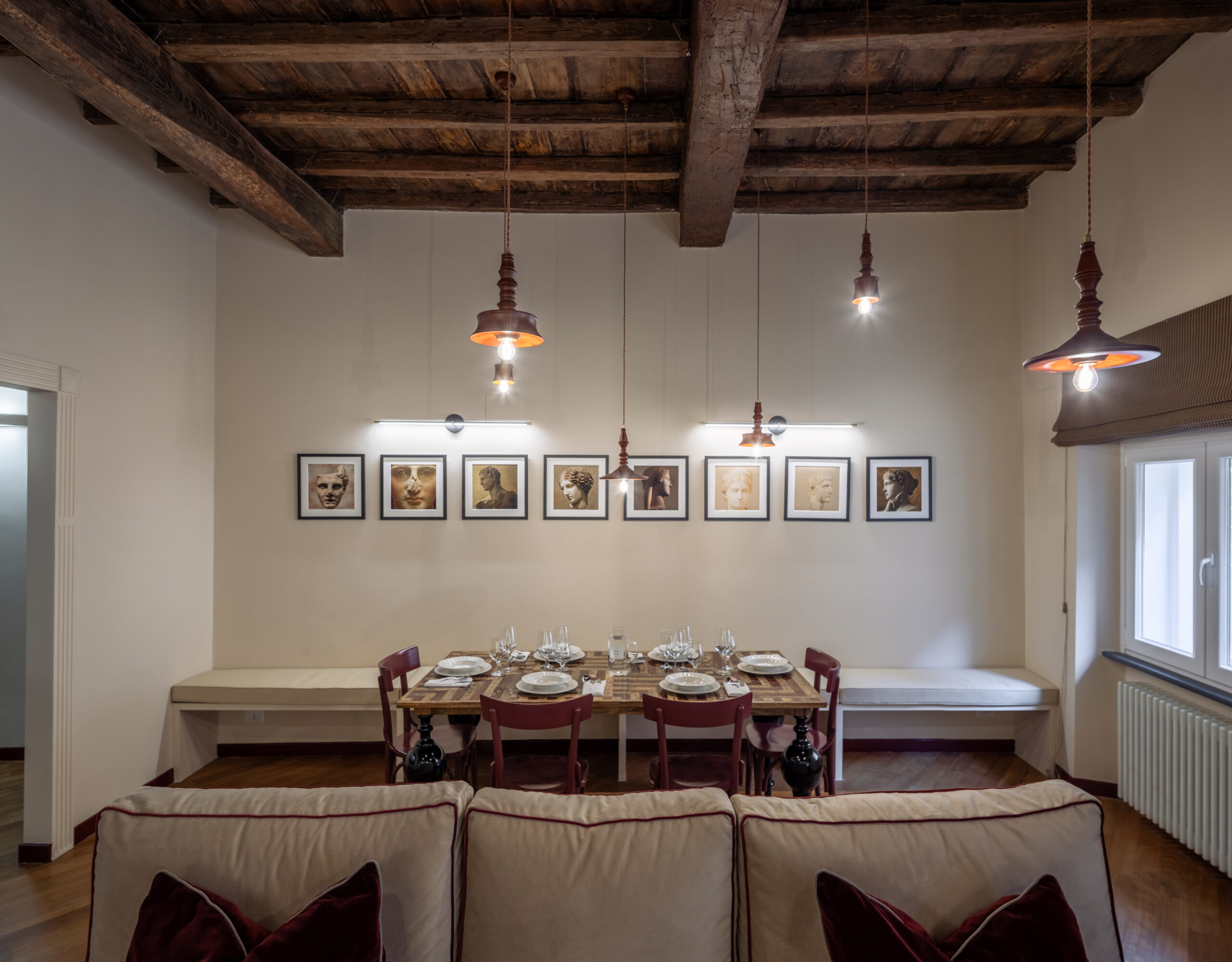 Elegant dining room in a Rome apartment blending modern comfort with historic design by Equity Residences(1)