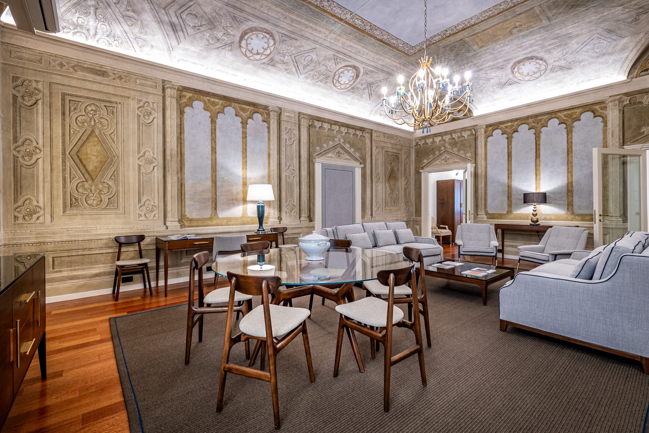 Spacious fresco living and dining room in a luxury apartment in Florence with Duomo view