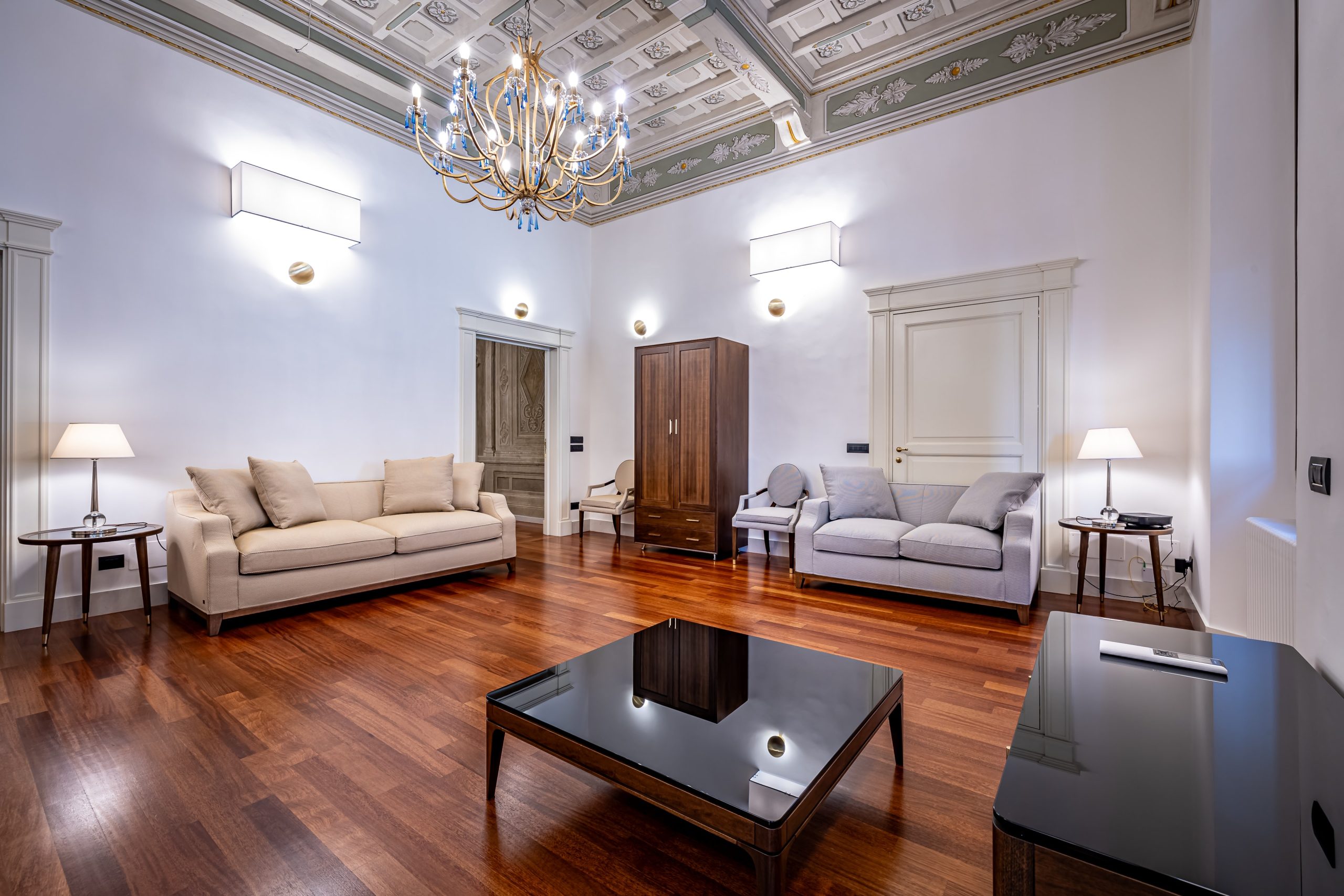 Modern living room with minimalist design in a luxury apartment in Florence with Duomo view