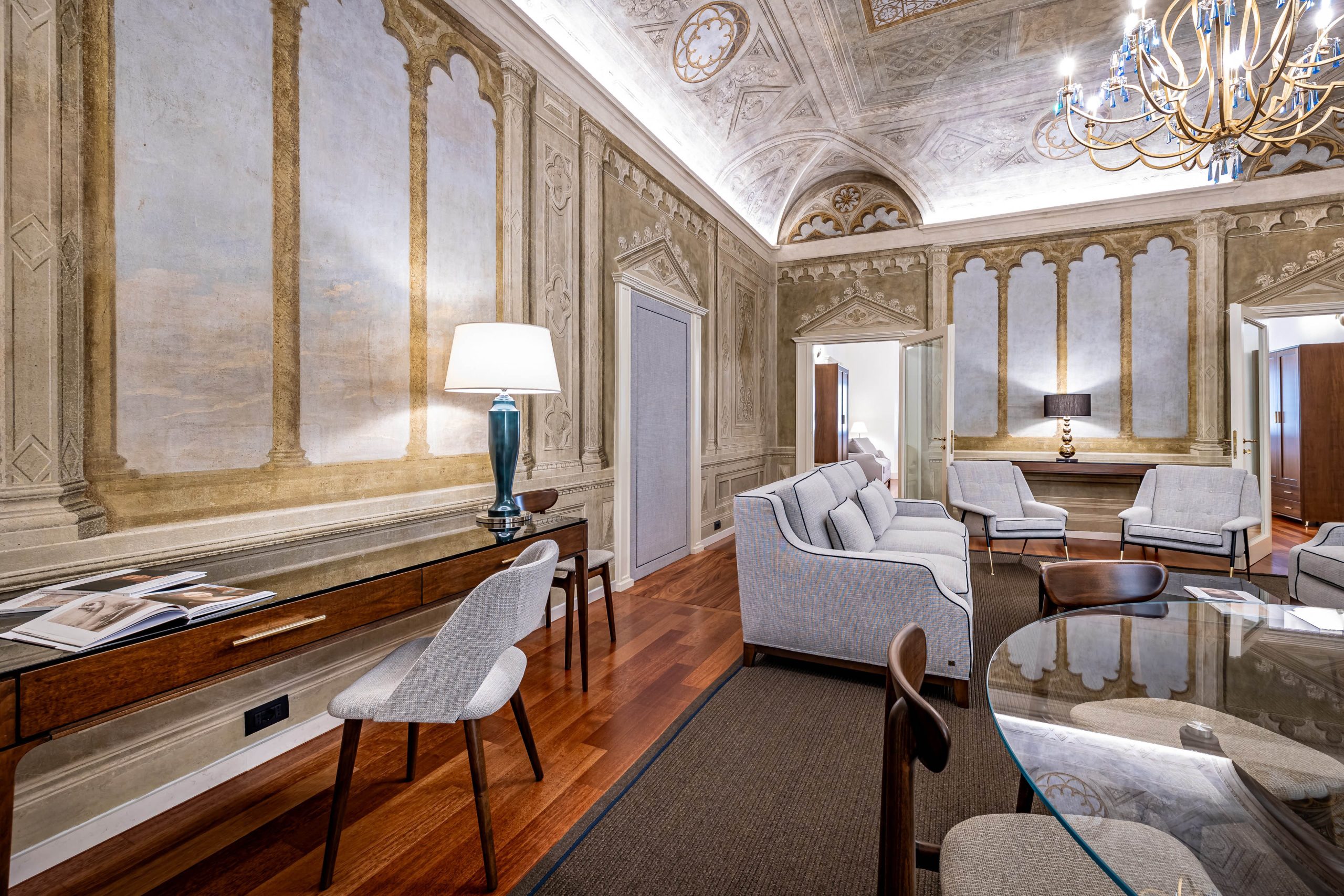 Open concept living space with classic decor in a luxury apartment in Florence with Duomo view