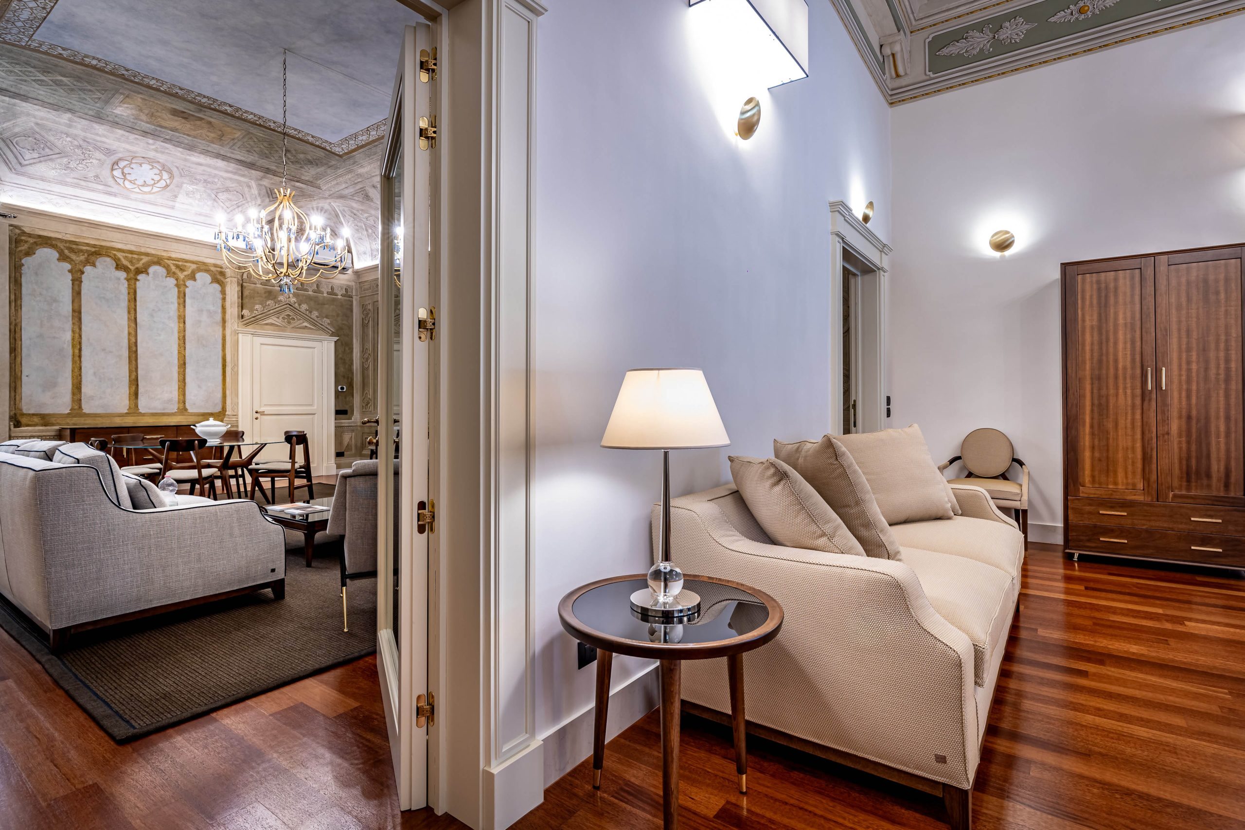 Modern living room with minimalist design in a luxury apartment in Florence with Duomo view