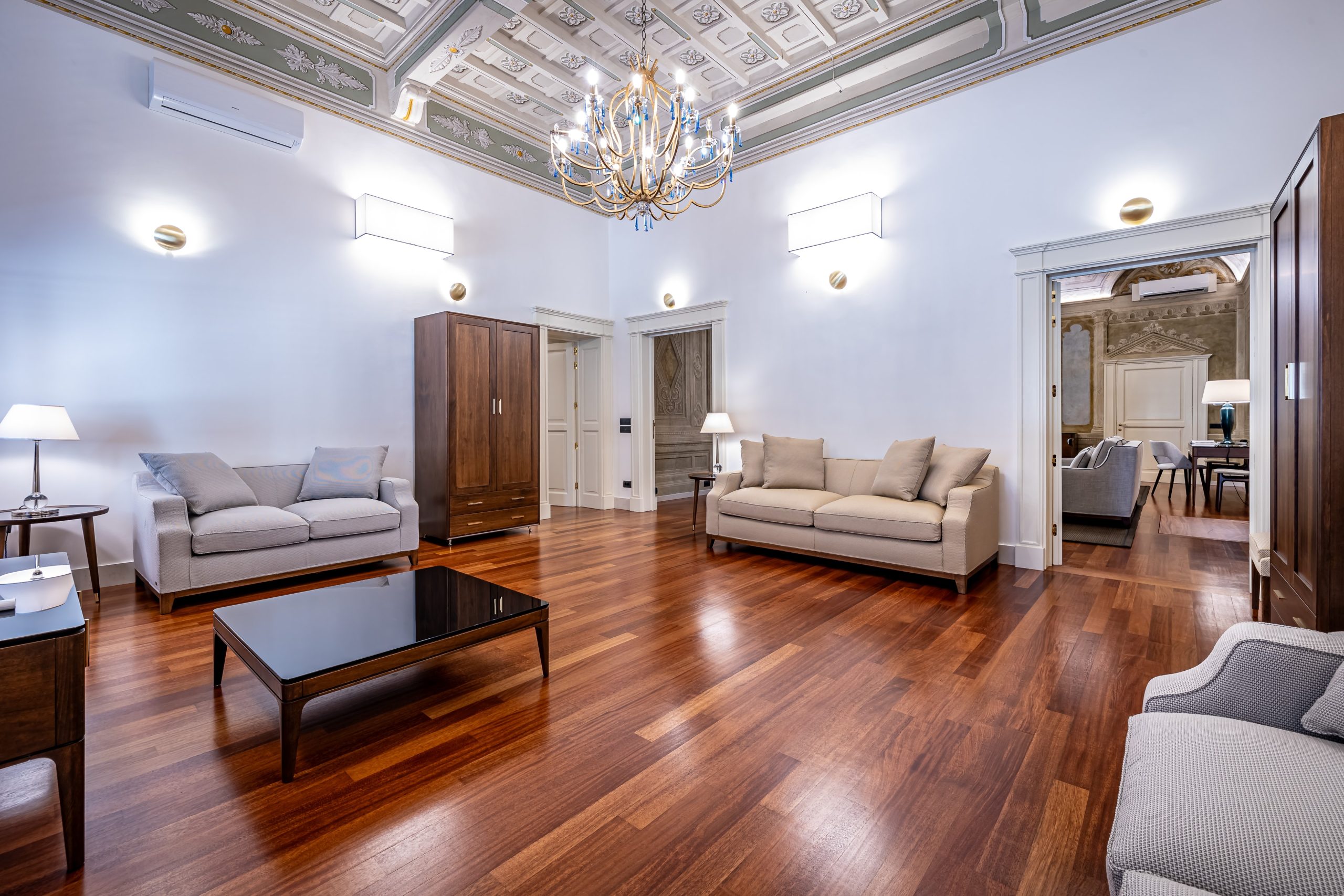 Cozy living room with sofa seating area in a luxury apartment in Florence with Duomo view