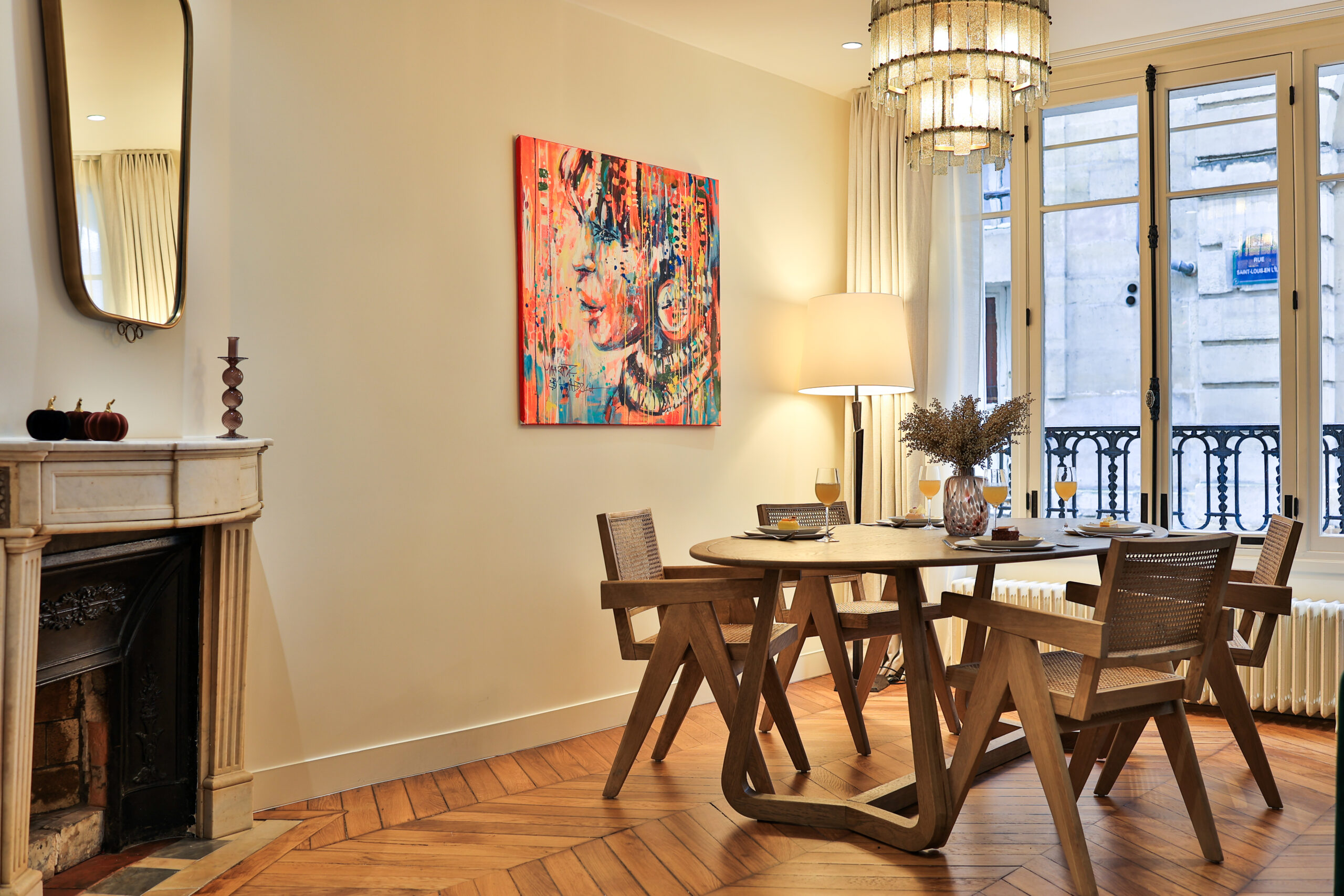Dining area with panoramic Parisian views at Apartment Île Saint-Louis