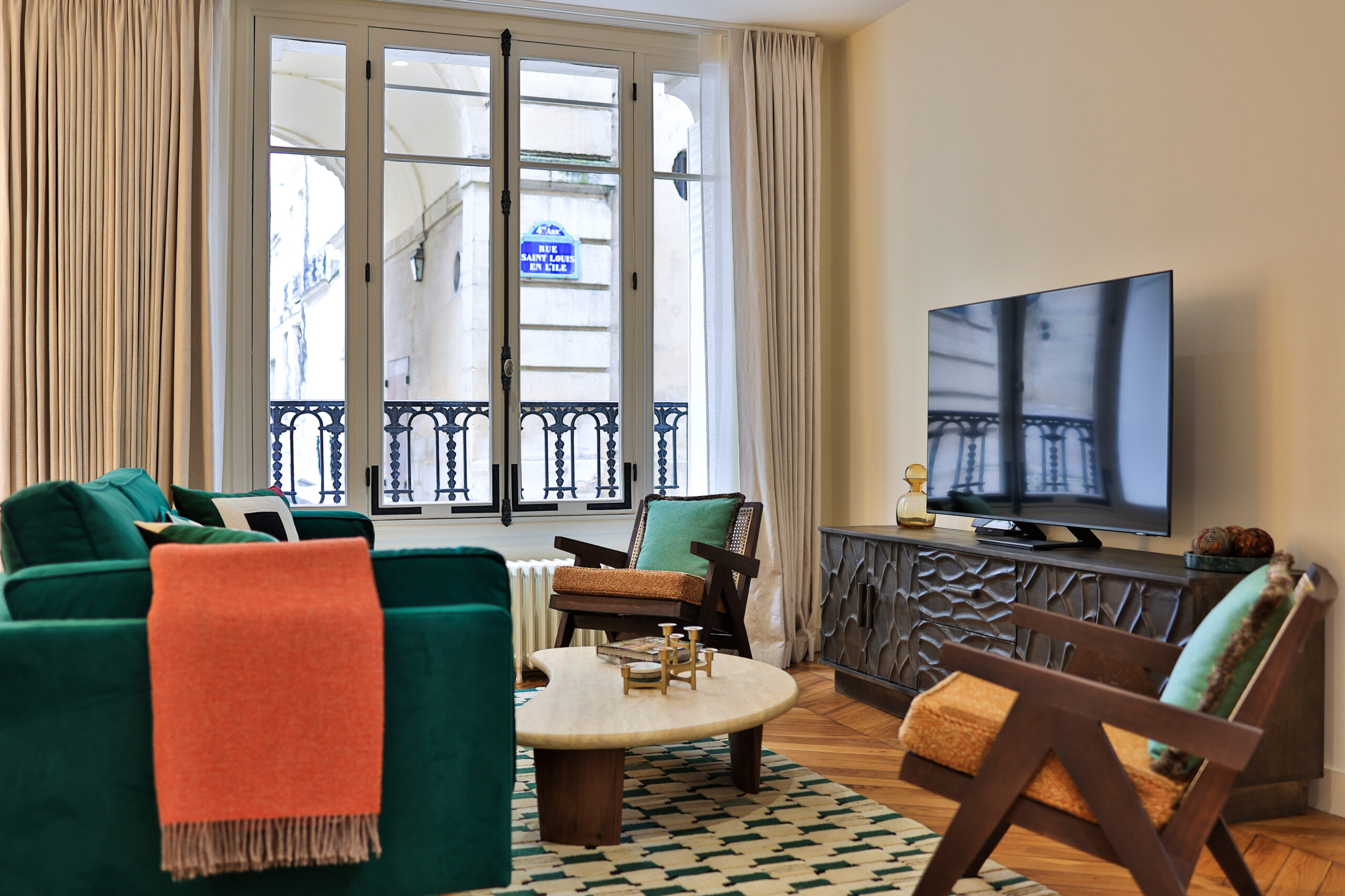 Stylish living space with beautiful Parisian views at Apartment Île Saint-Louis